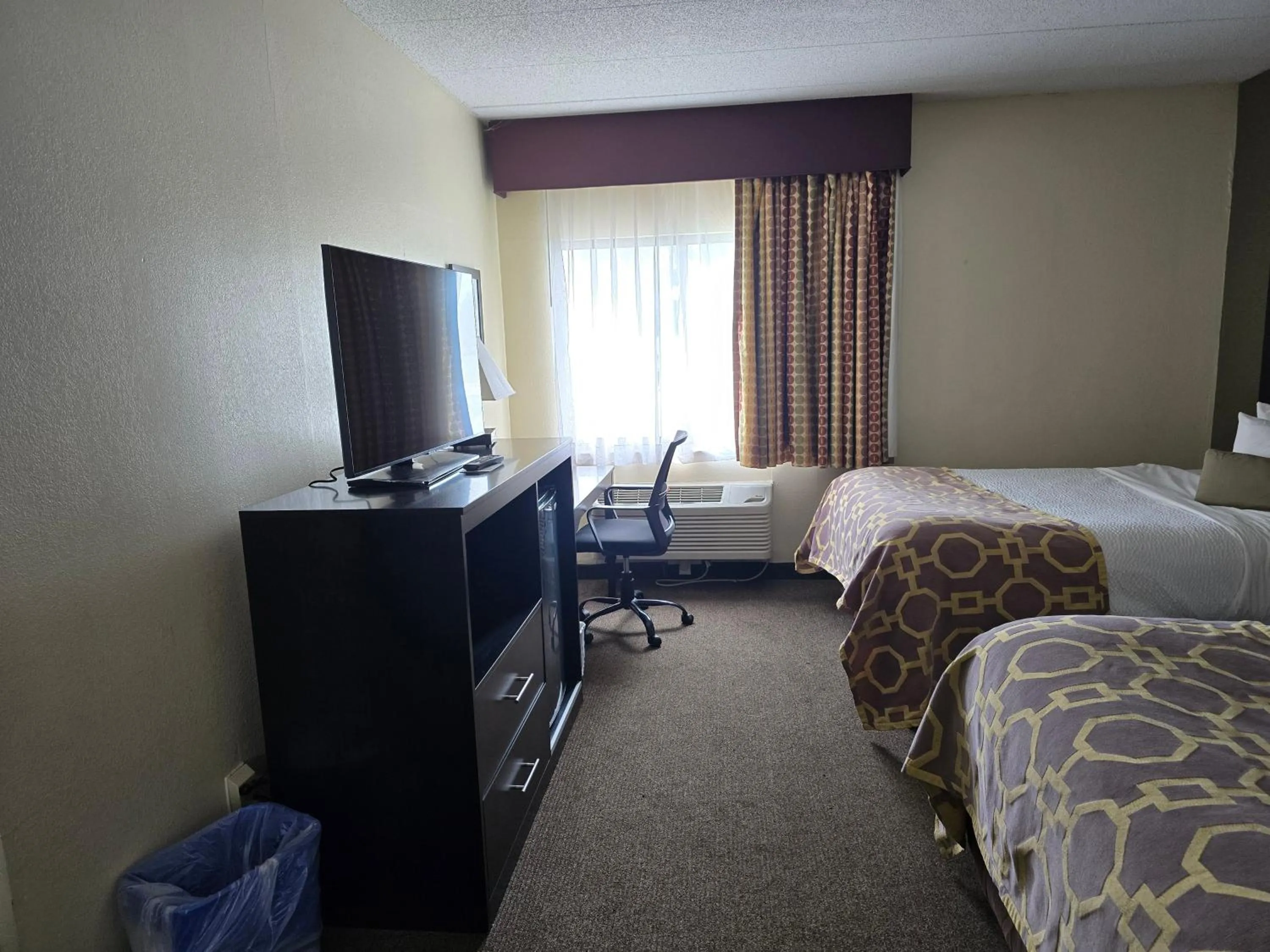 Bedroom, Bed in Baymont by Wyndham Janesville