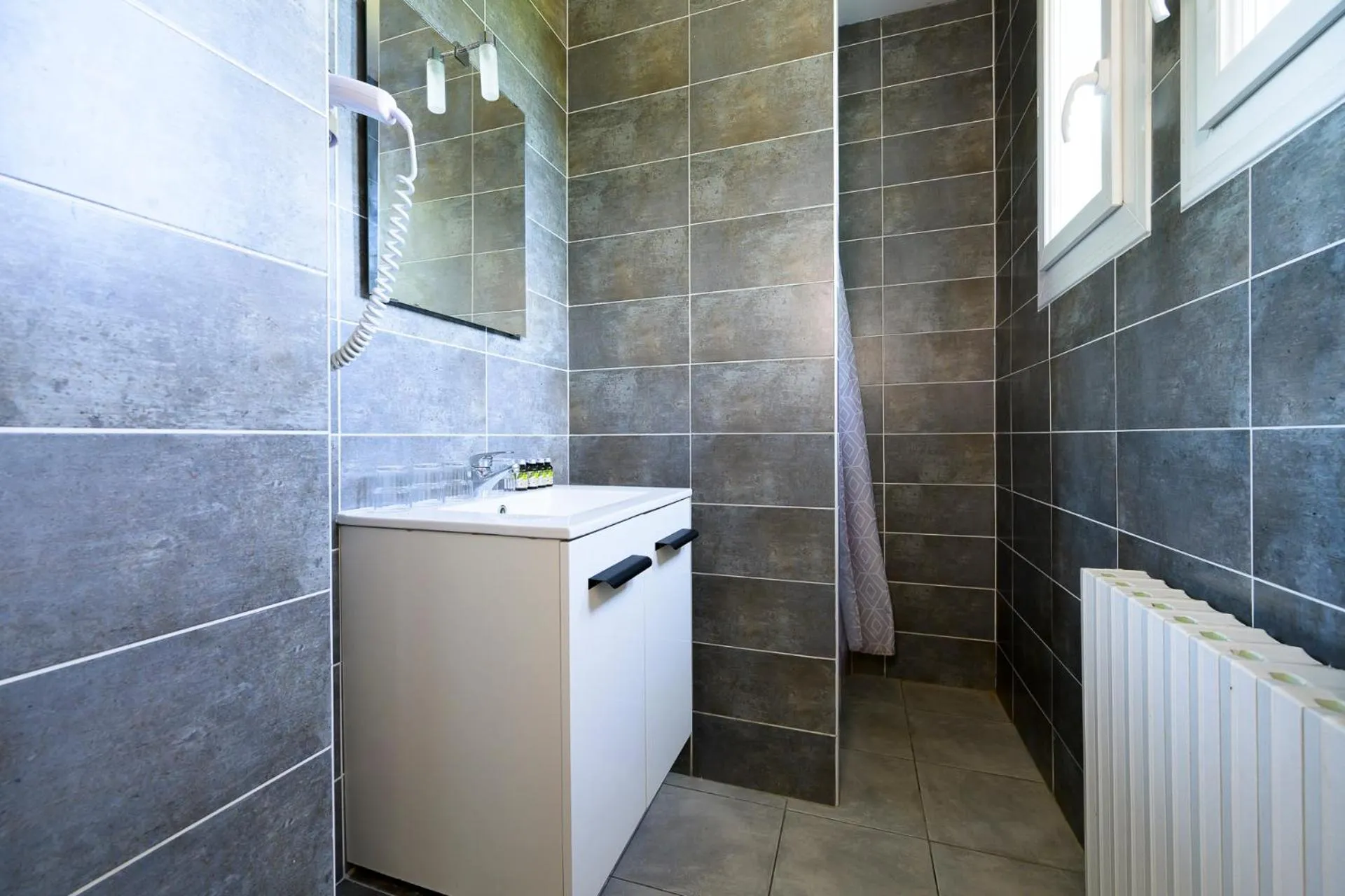 Bathroom in Hôtel de La Beauronne