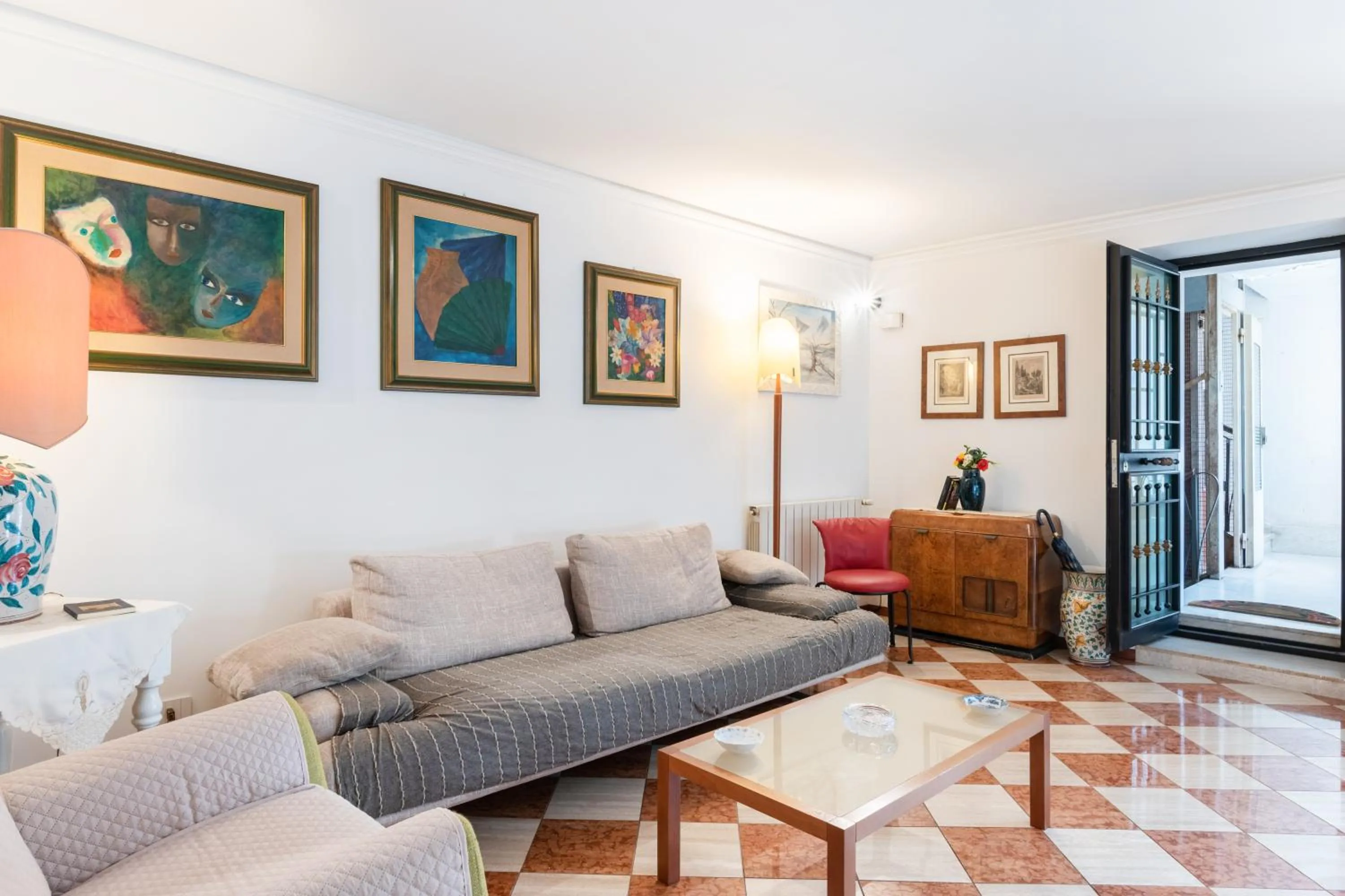 Living room in GuestHost - Via Etnea Cozy Apartment with Balcony