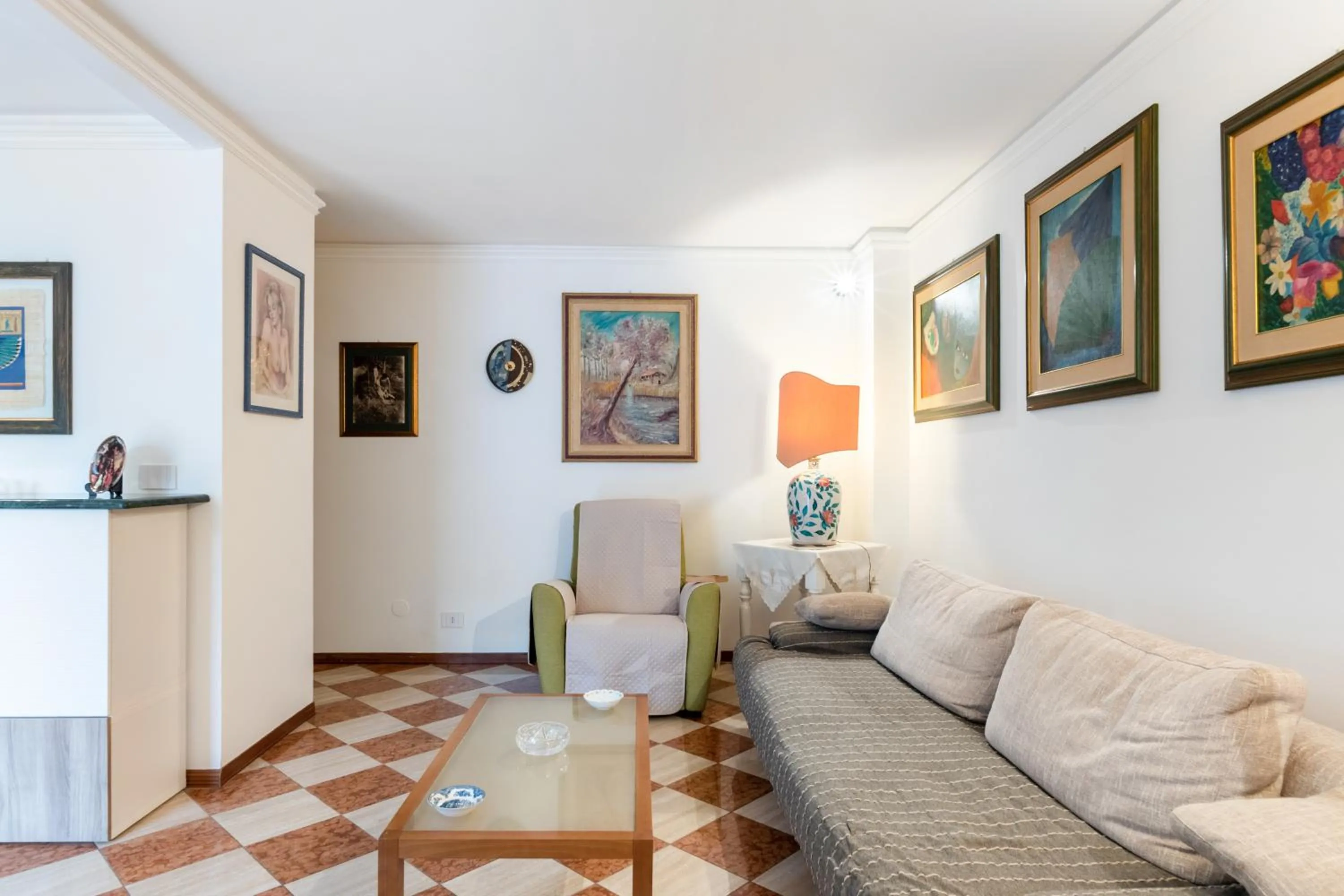Living room in GuestHost - Via Etnea Cozy Apartment with Balcony