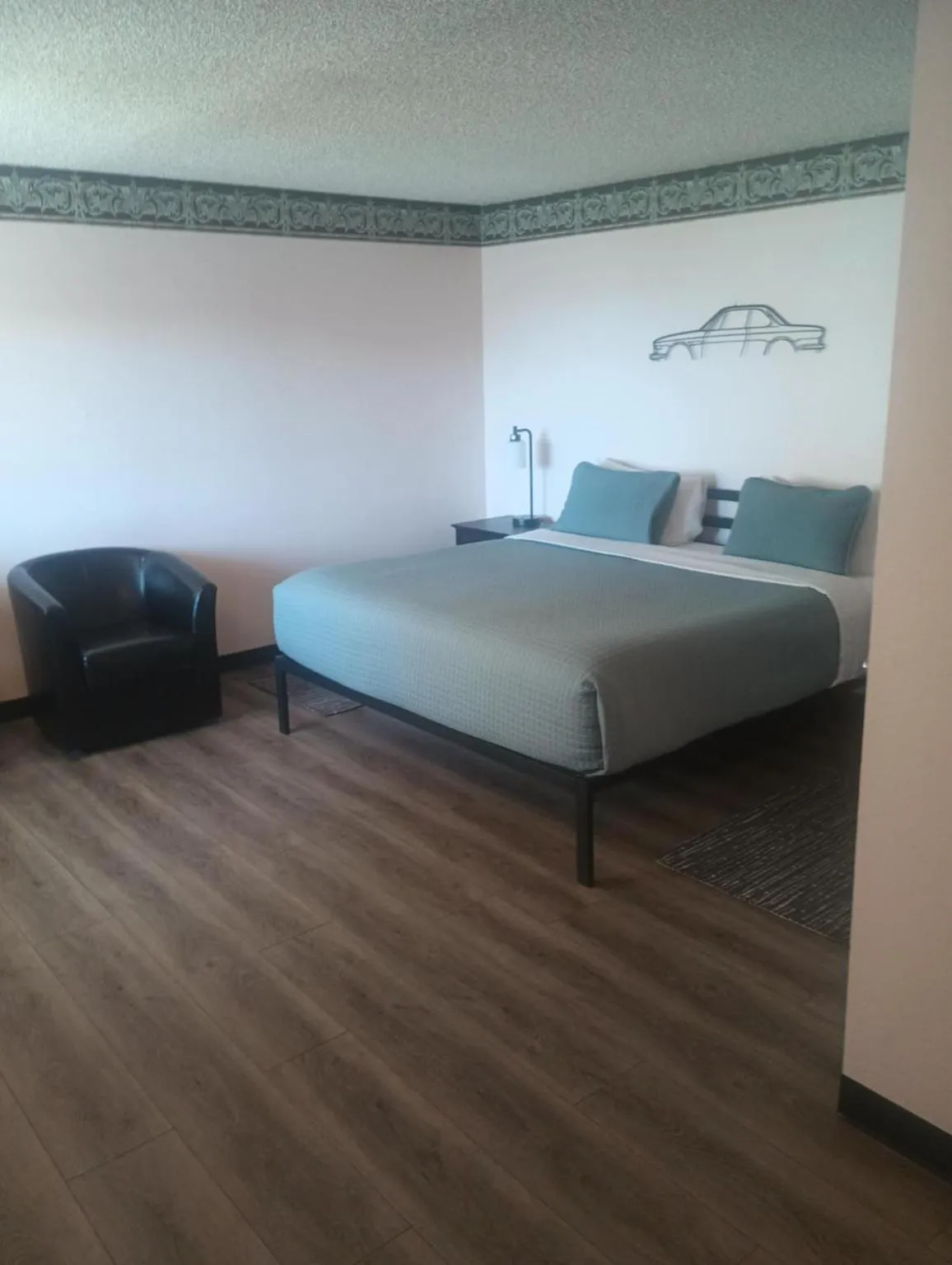 Bed in Coast Riders Inn