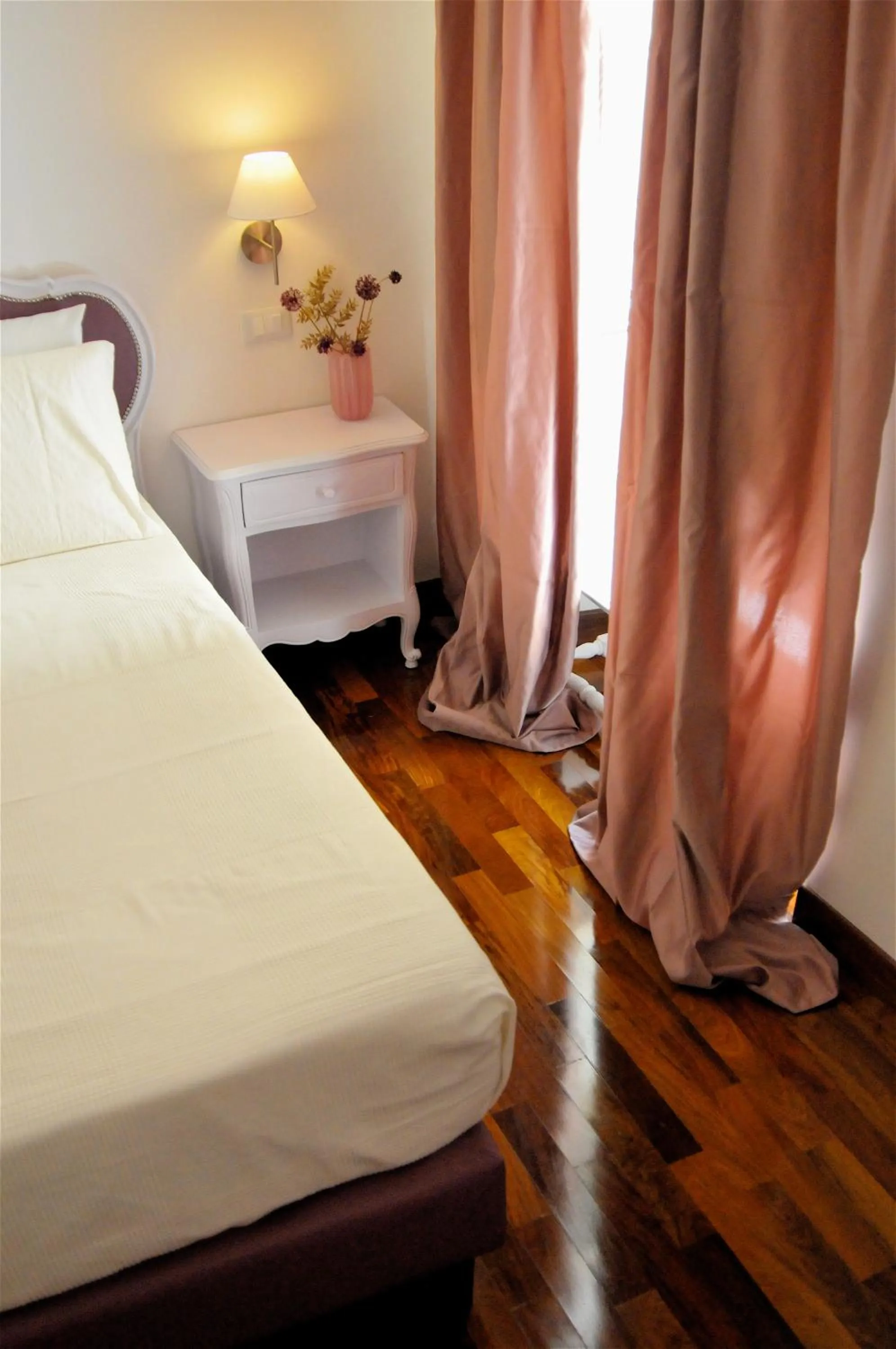 Bedroom in Feliz in Roma B&B