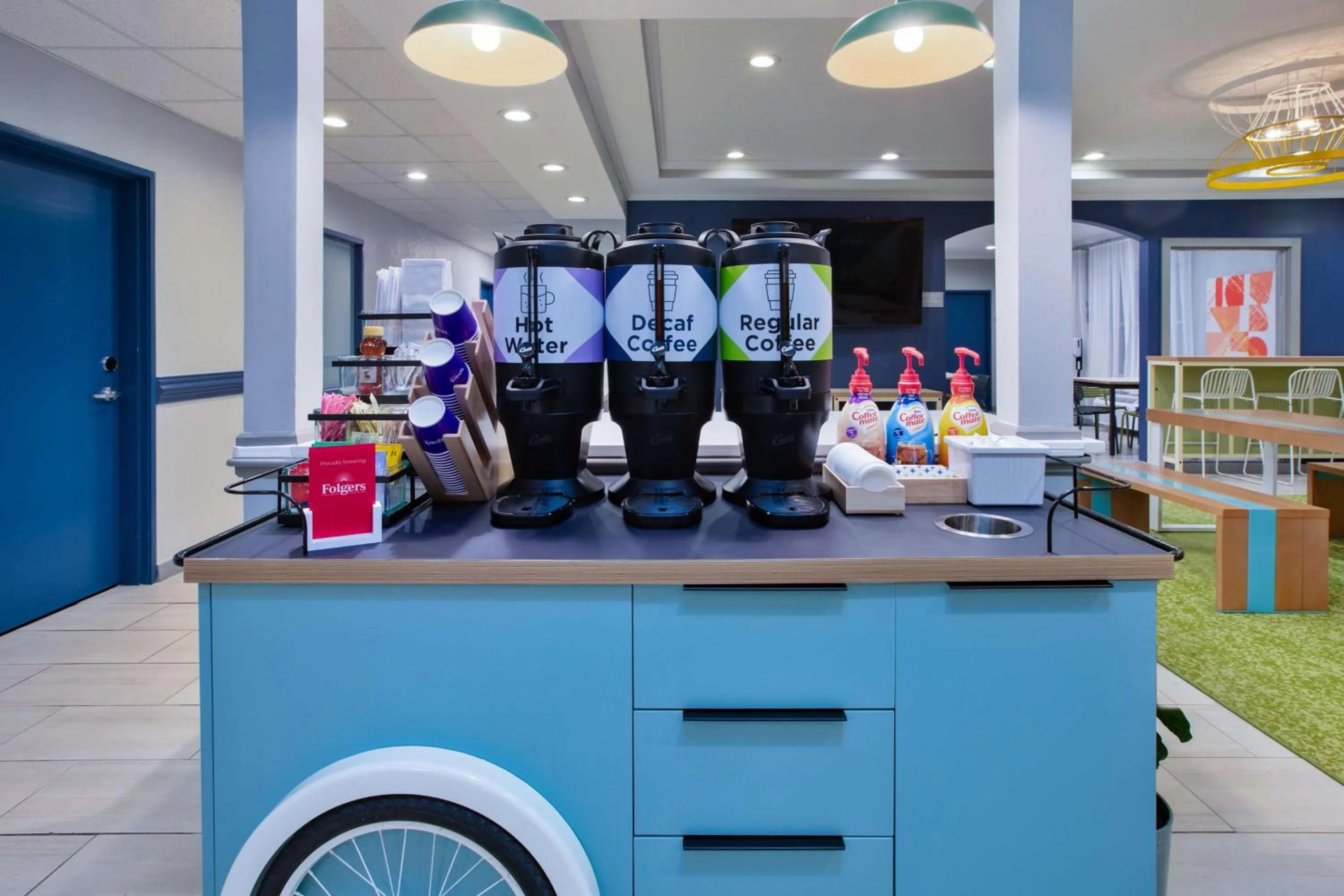 Dining area in Spark by Hilton Walker Grand Rapids North