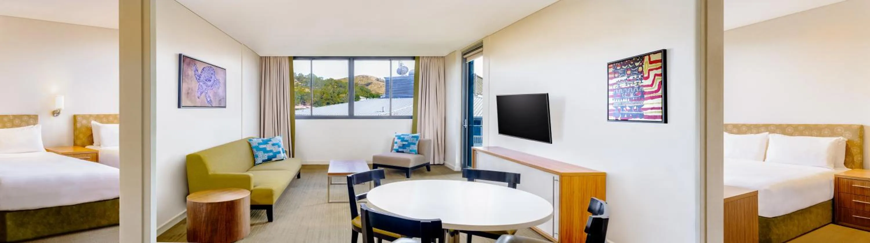 Communal lounge/ TV room, Bed in Holiday Inn & Suites Port Moresby by IHG