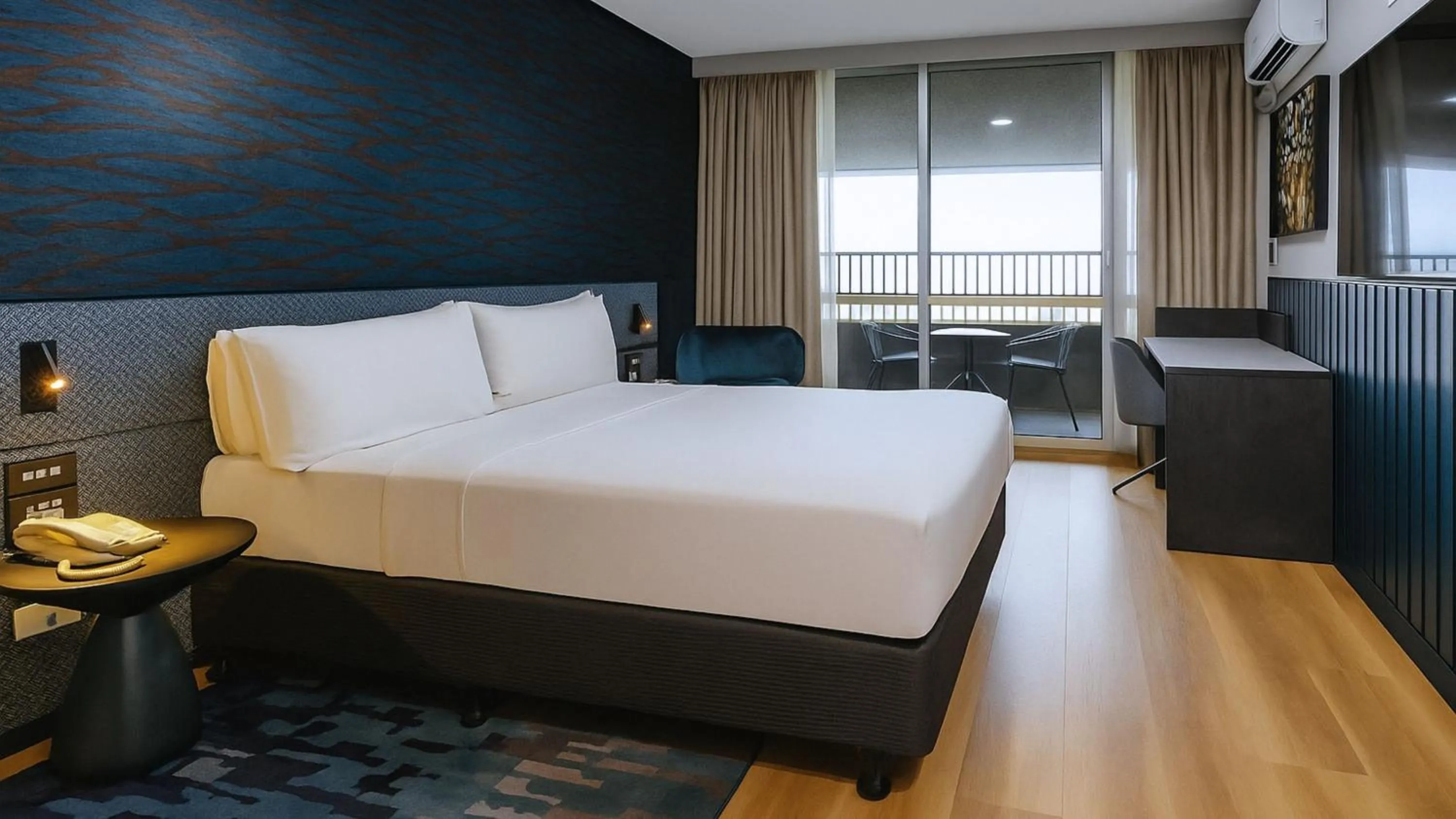 Photo of the whole room, Bed in Holiday Inn & Suites Port Moresby by IHG