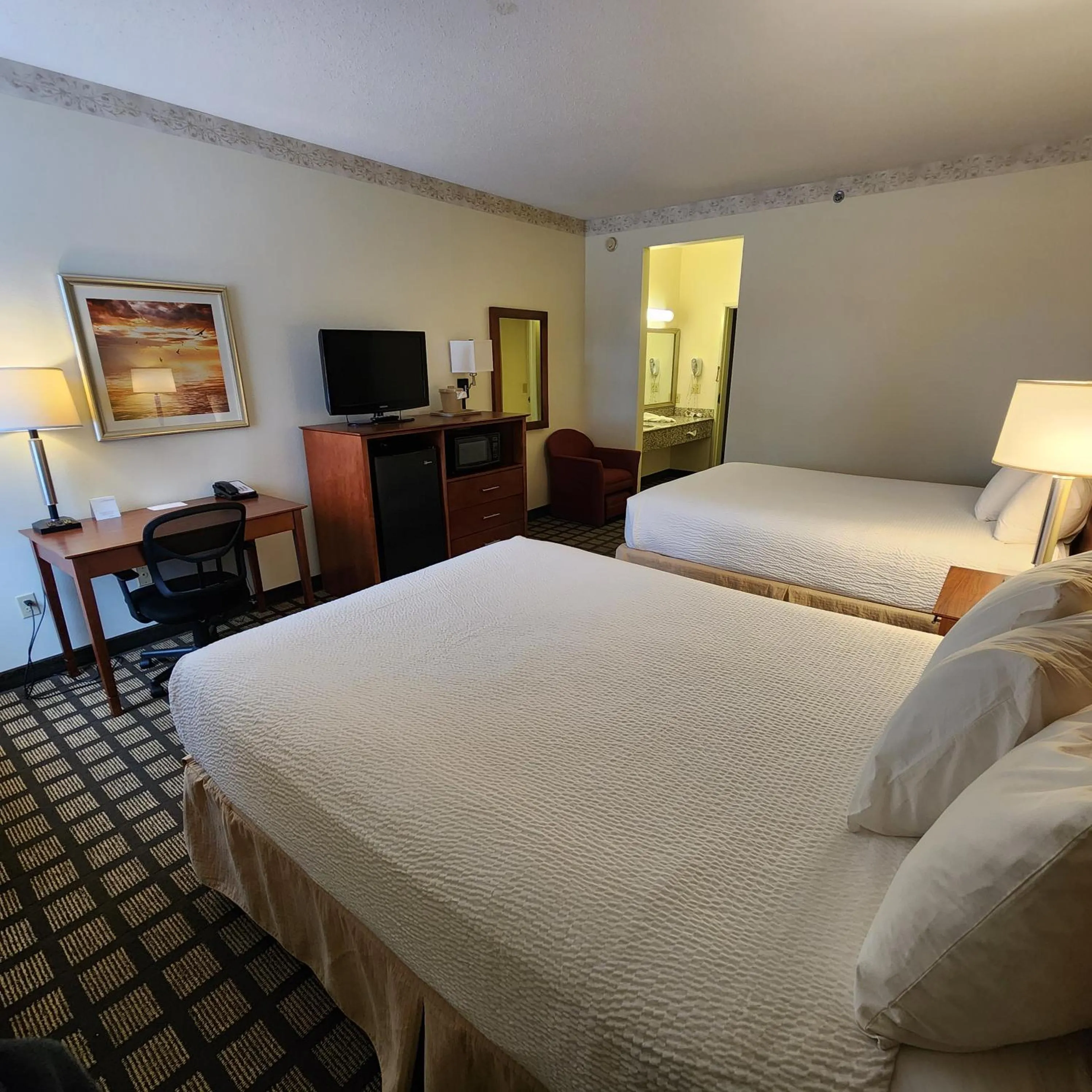 Photo of the whole room, Bed in Baymont by Wyndham Mackinaw City
