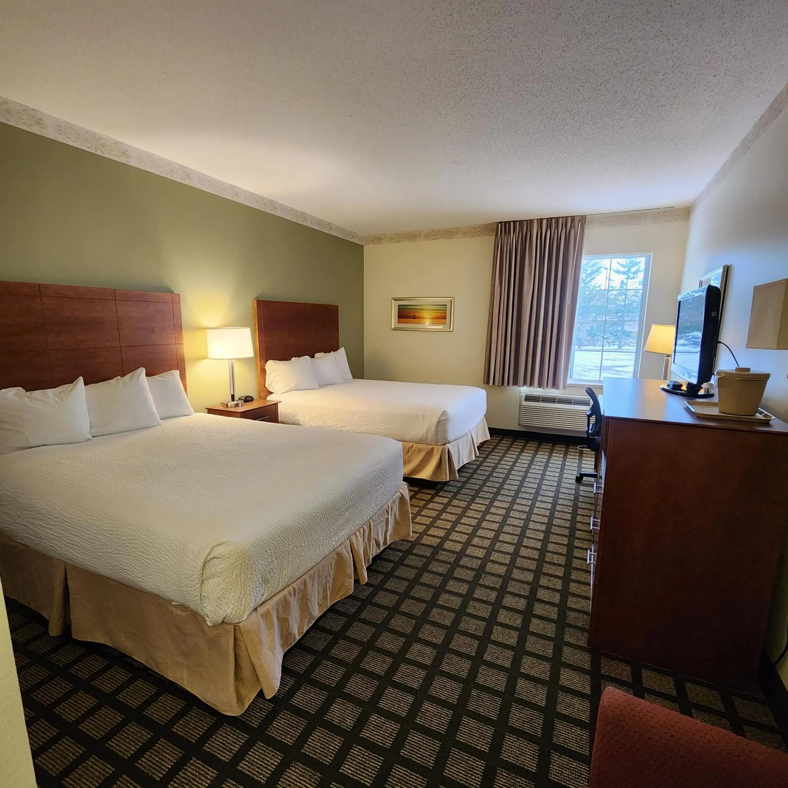 Photo of the whole room, Bed in Baymont by Wyndham Mackinaw City