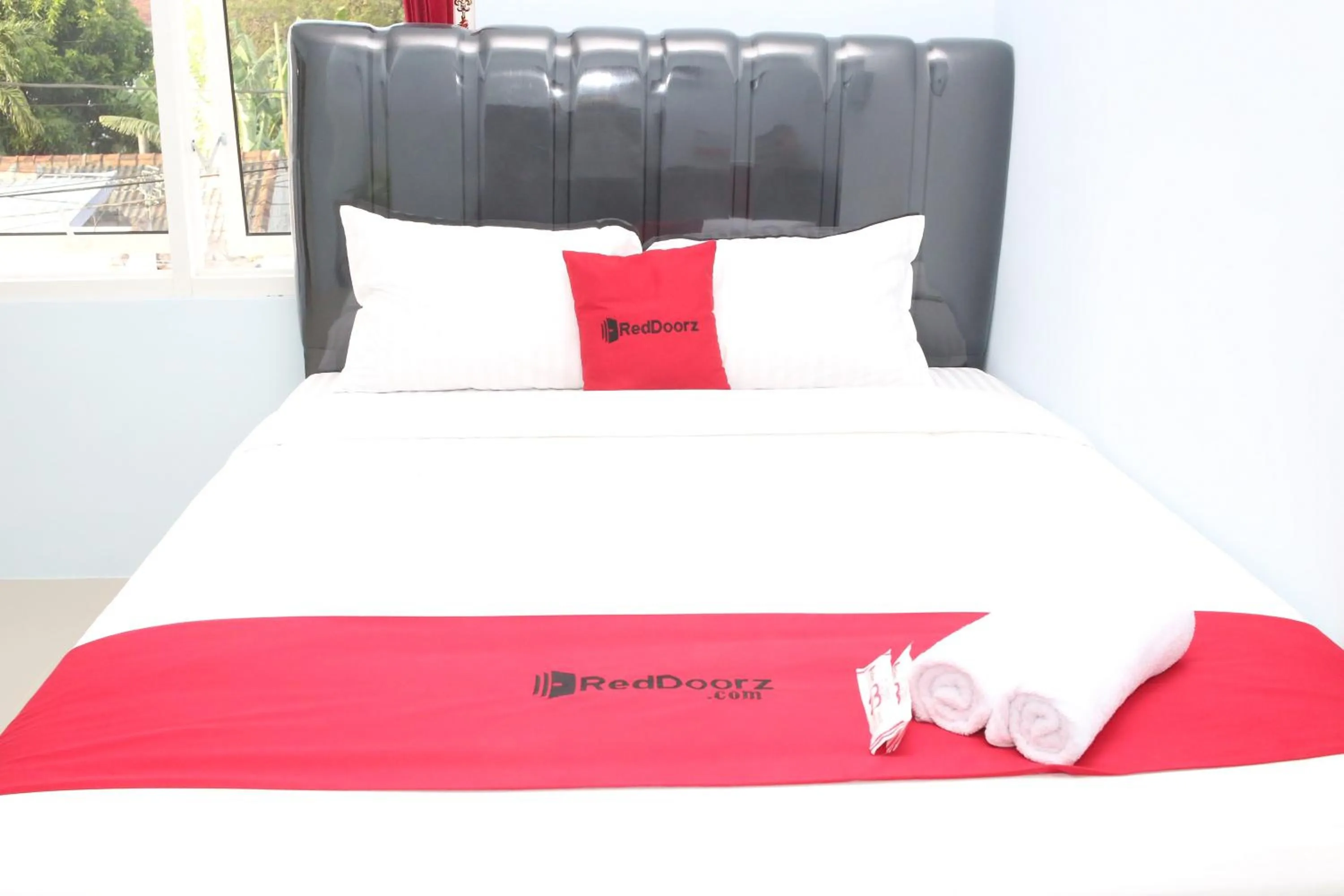 Bed in RedDoorz Syariah near Suncity Mall Madiun