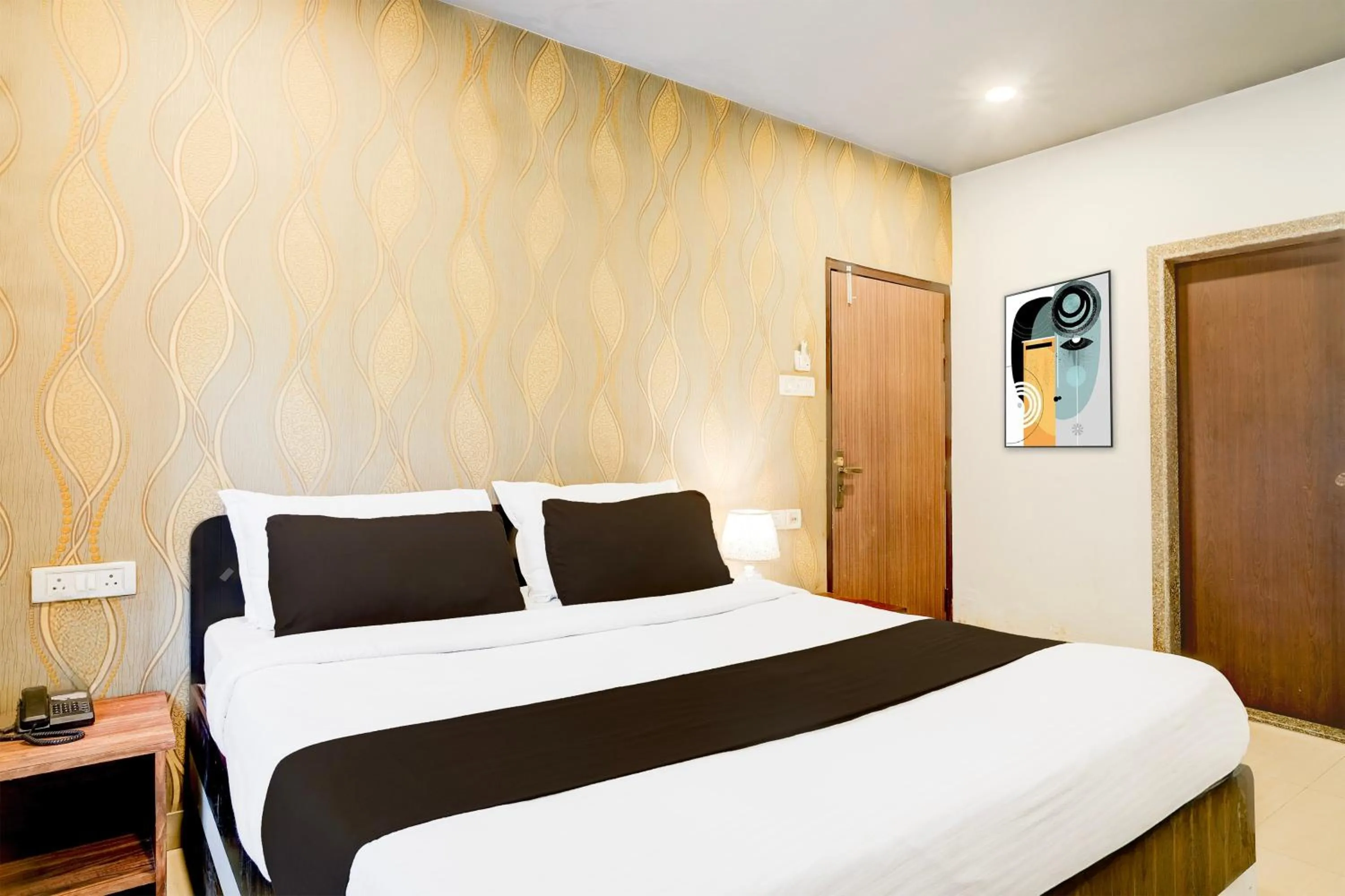 Bedroom, Bed in Super Townhouse Beltola Tiniali Formerly Hotel Pratishtha
