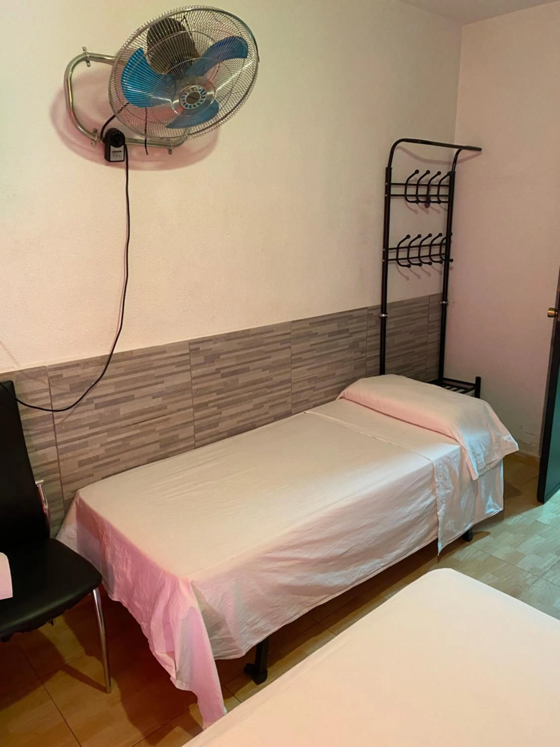 Bed in PENSIÓN ROSA