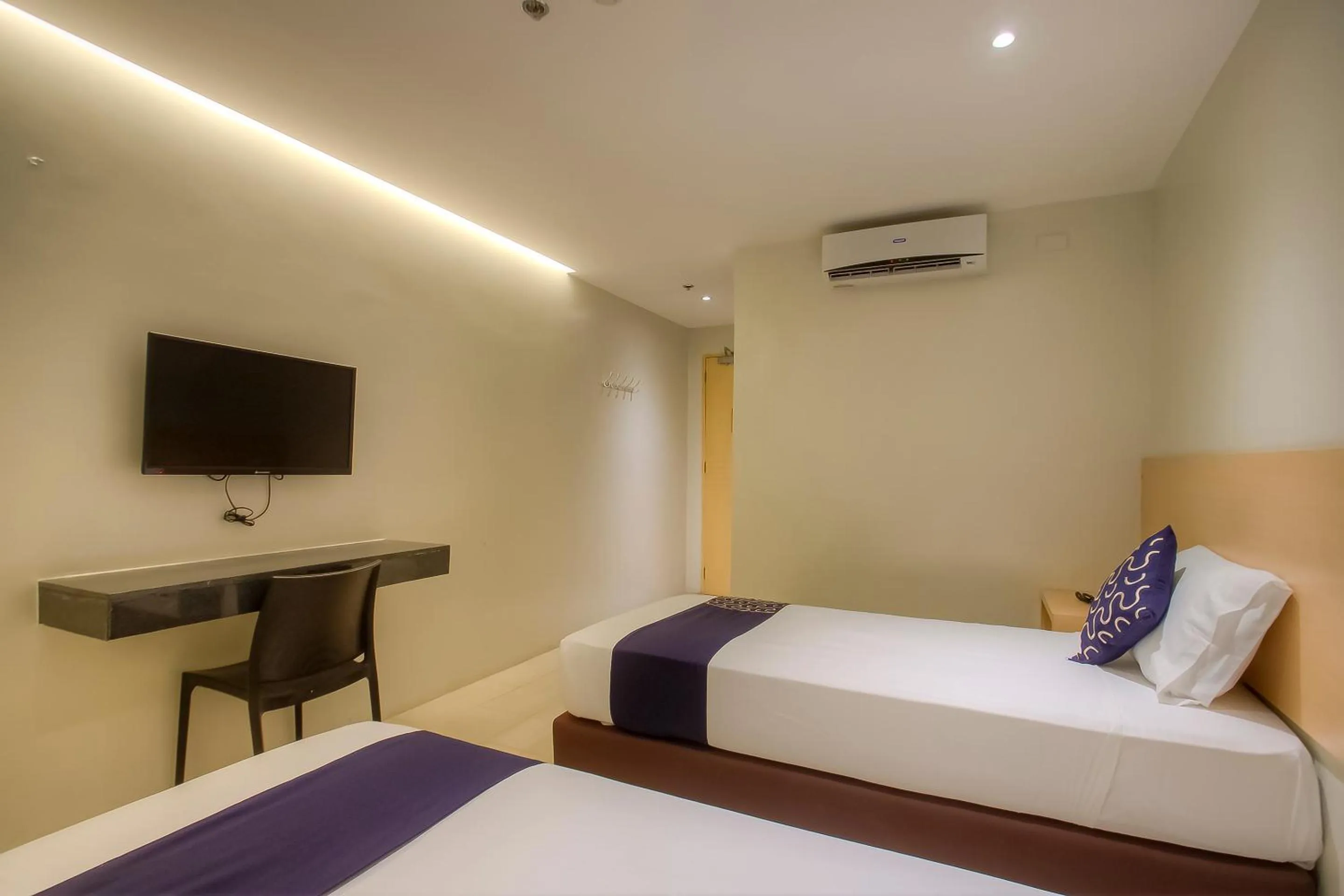 Bedroom, Bed in Capital O 827 Speciale Hotel