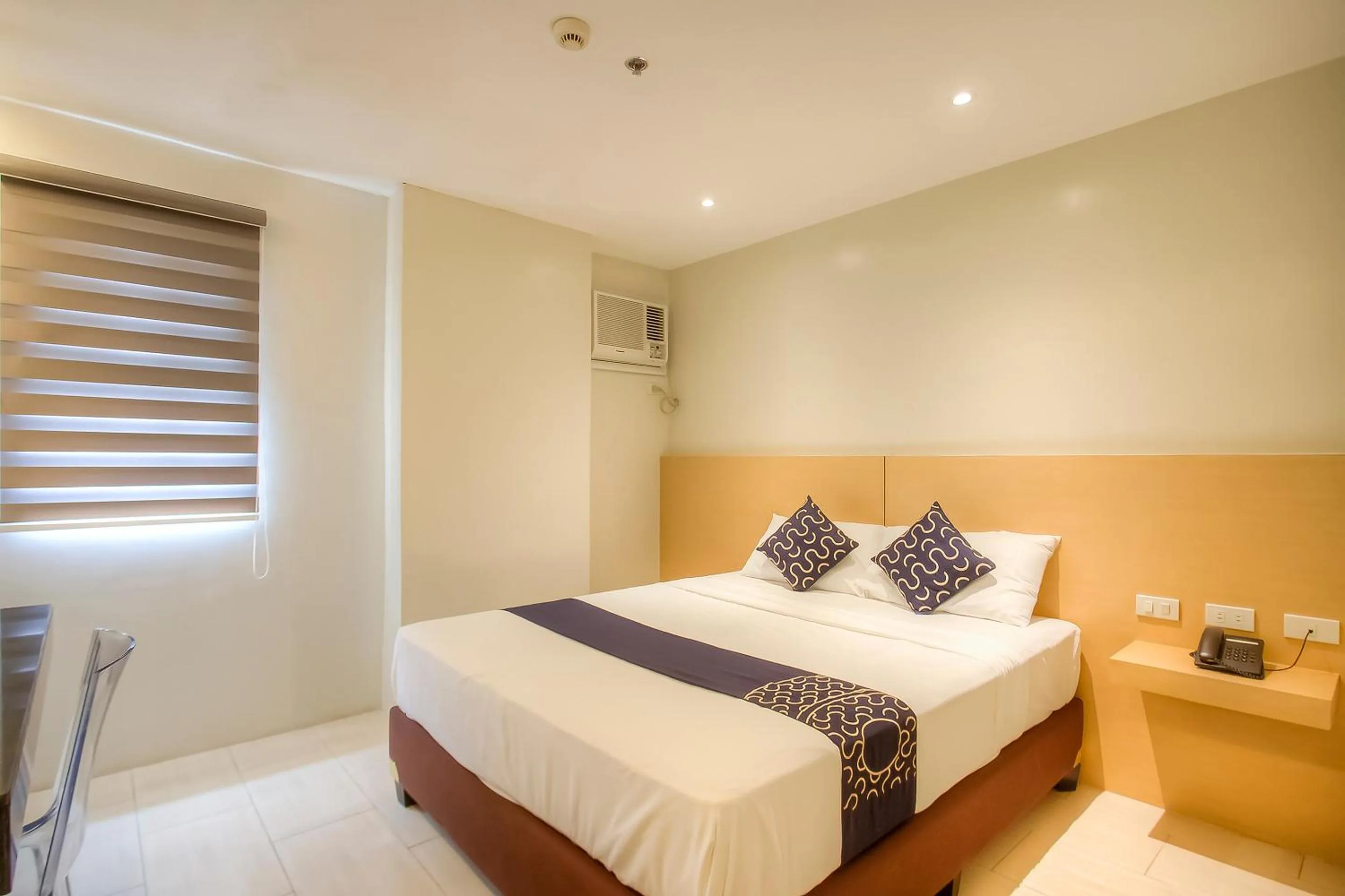 Bedroom, Bed in Capital O 827 Speciale Hotel