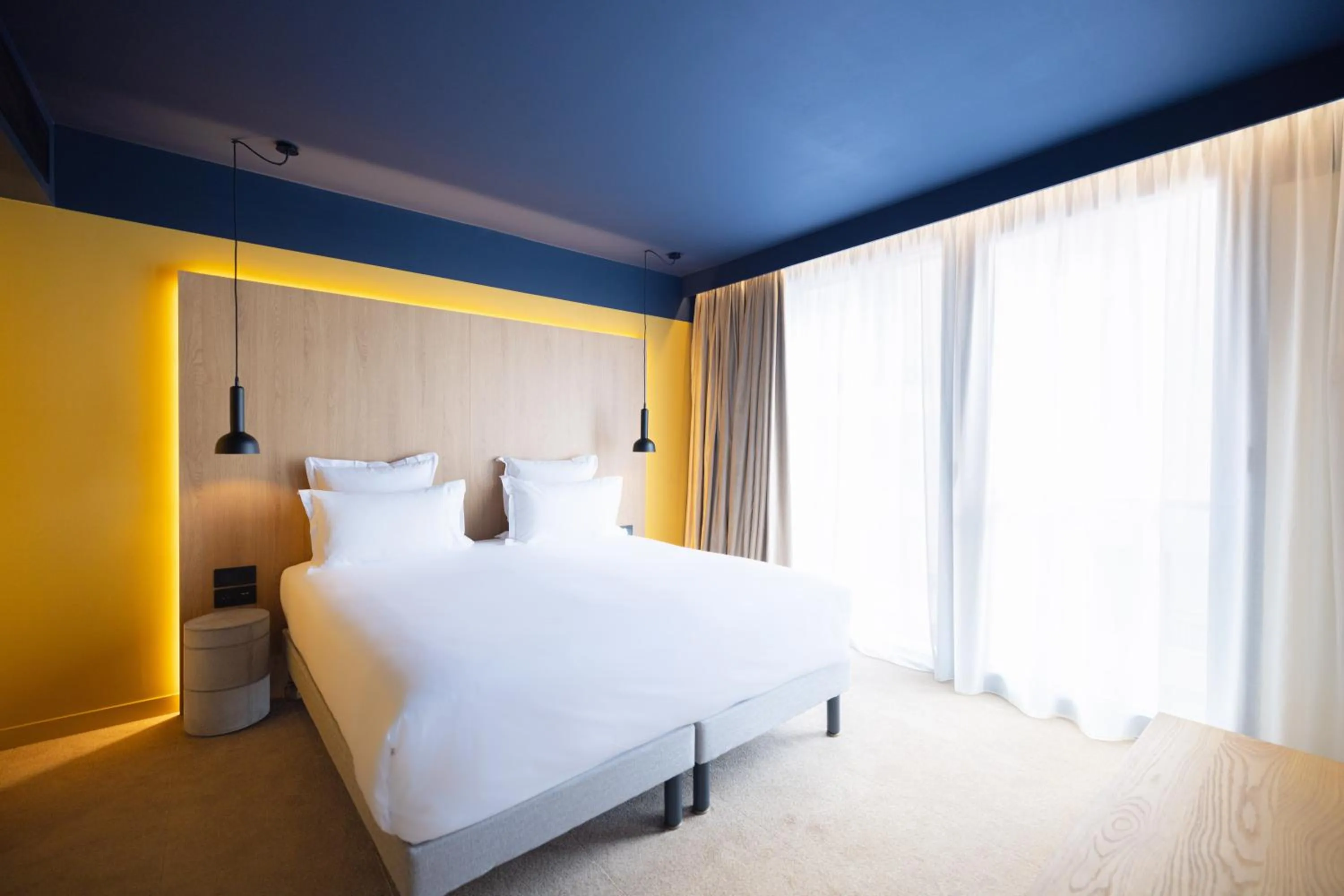 Bedroom, Bed in KOPSTER Hotel Residence Paris Ouest Colombes