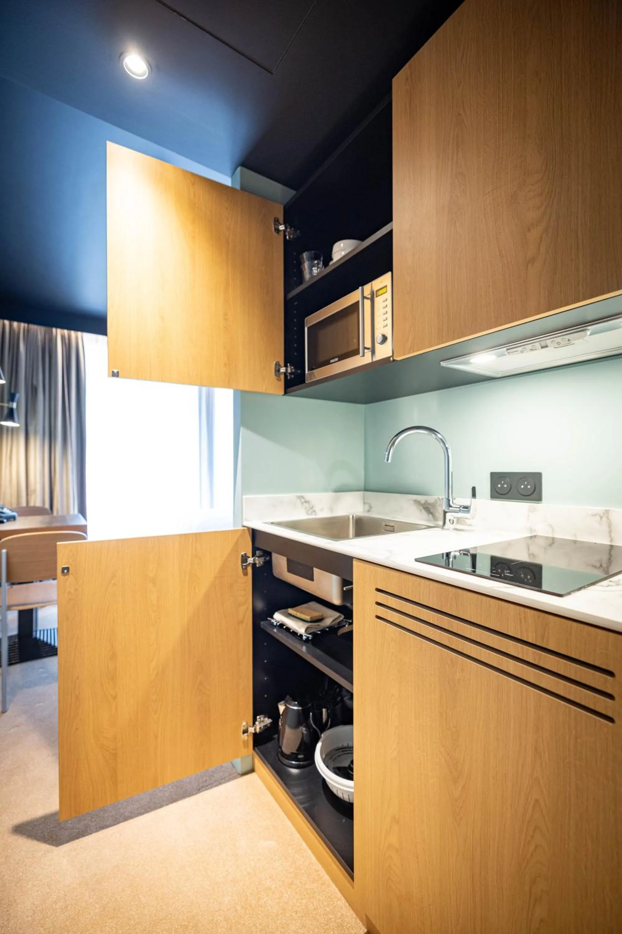 Kitchen or kitchenette in KOPSTER Hotel Residence Paris Ouest Colombes