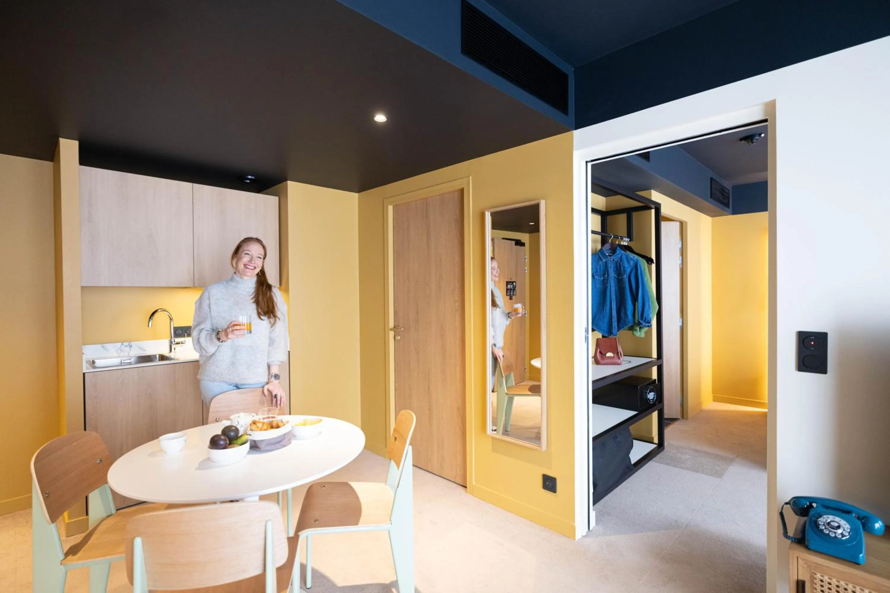 Kitchen or kitchenette, Bed in KOPSTER Hotel Residence Paris Ouest Colombes