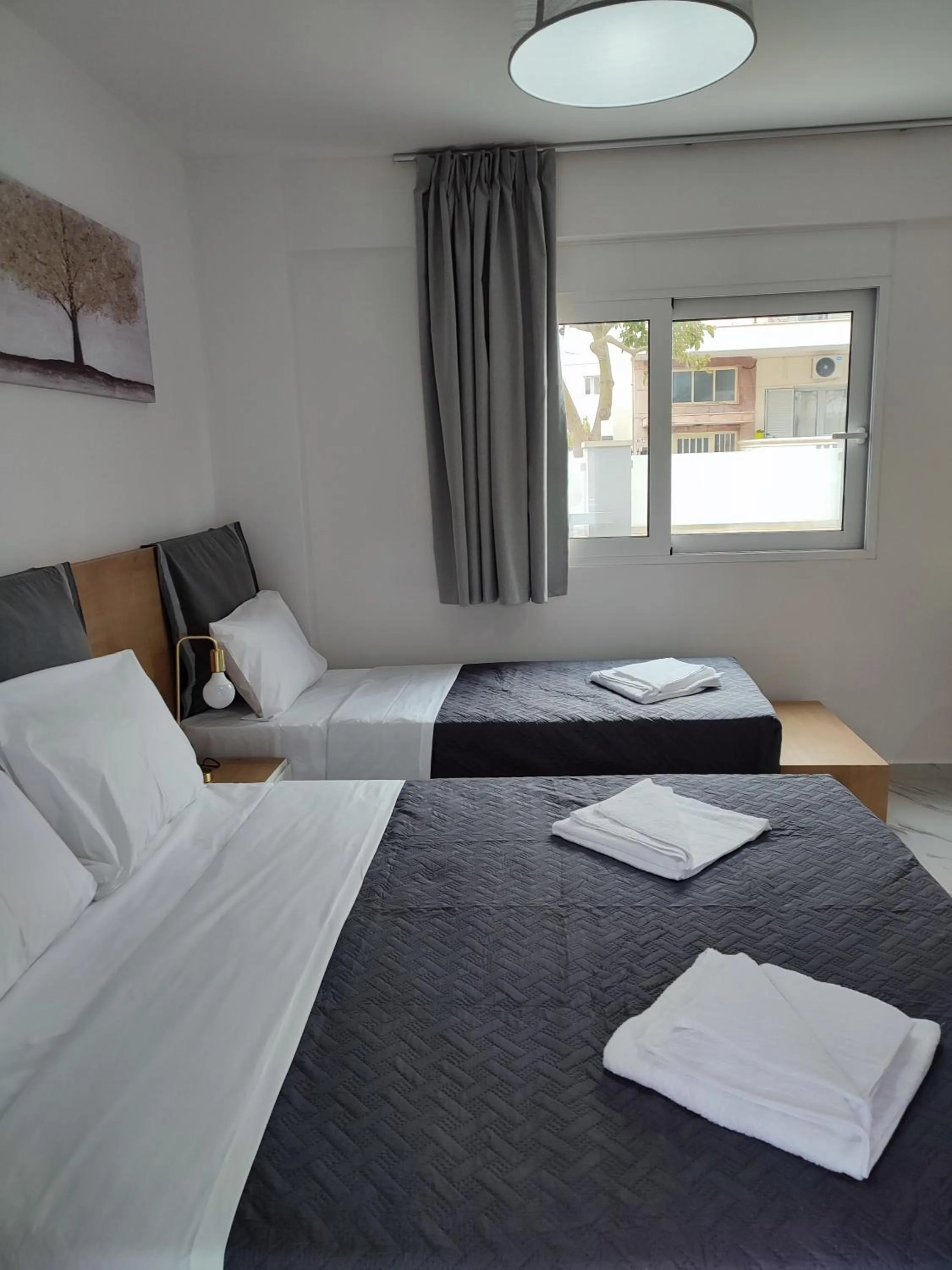 Bed in Deluxe City Hotel