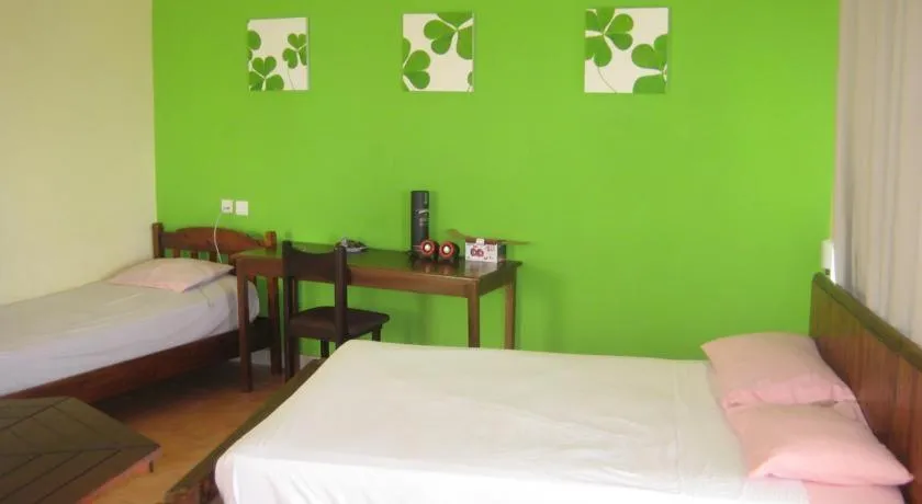 Bed in Le cactus guesthouse