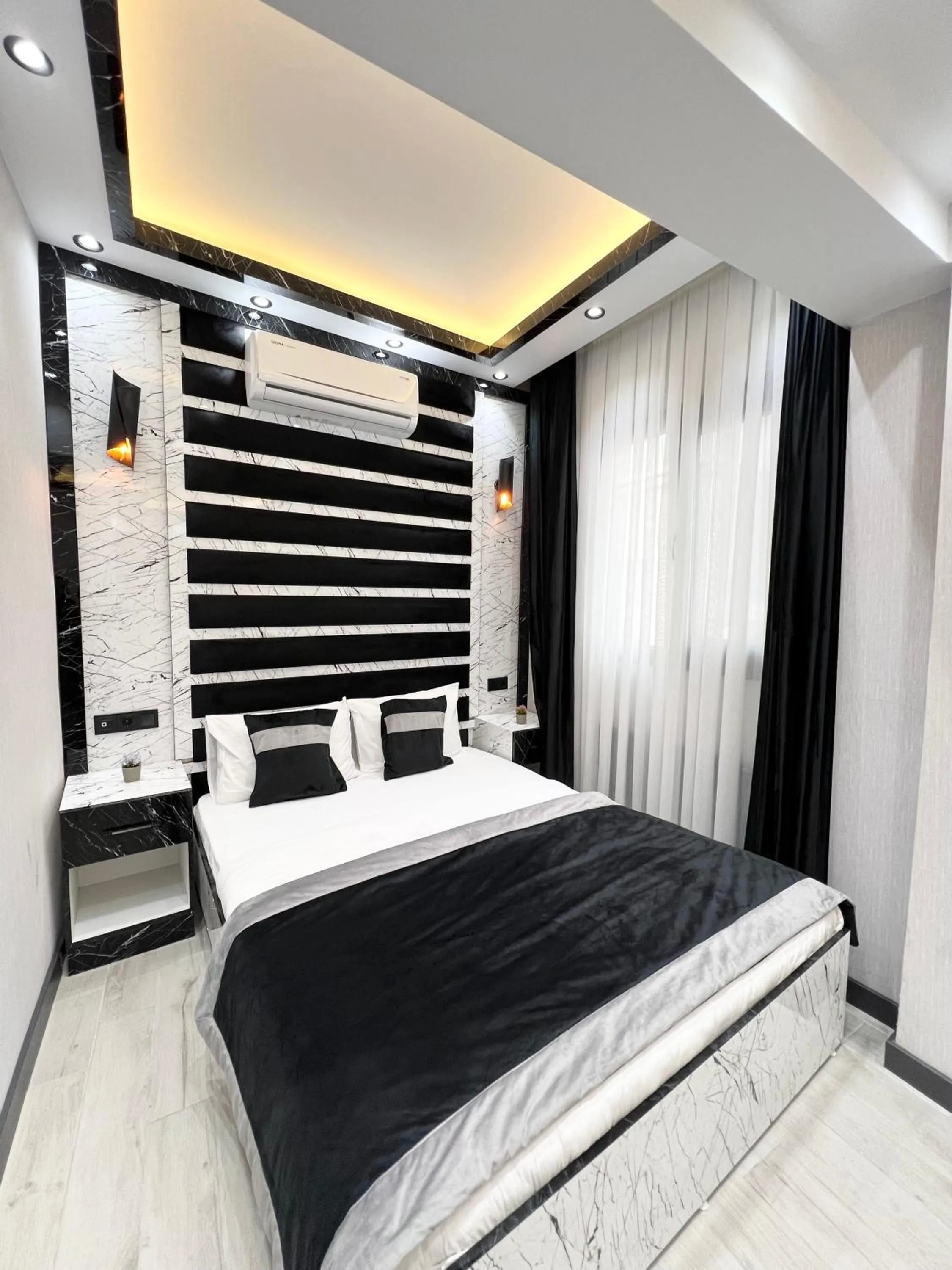 Bed in Taksim Larissa hotel suites