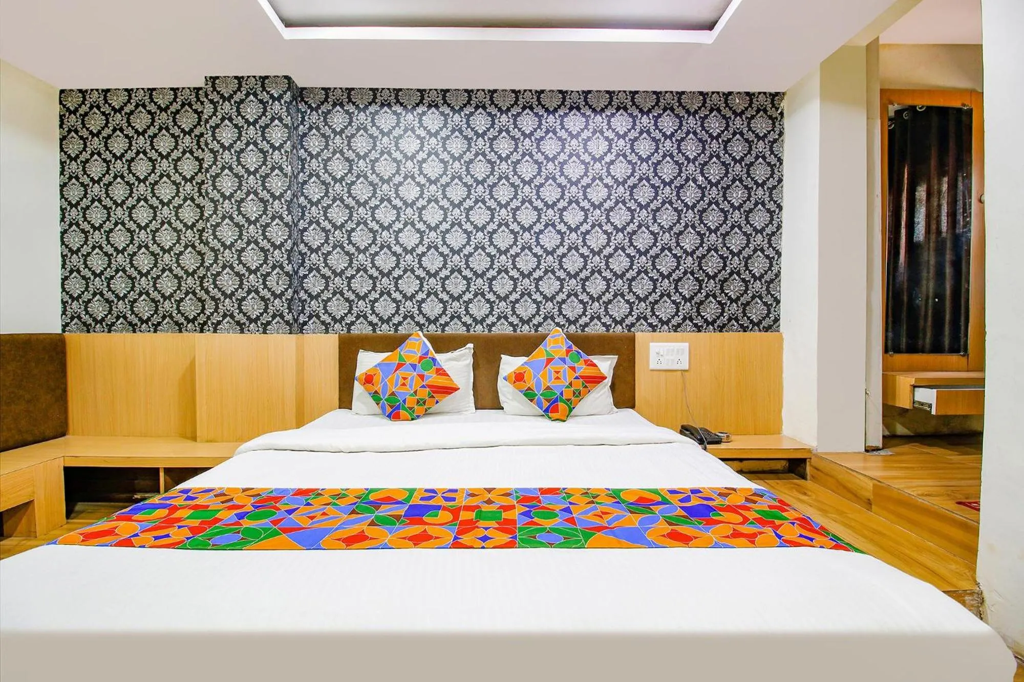 Bed in FabHotel Surbhi