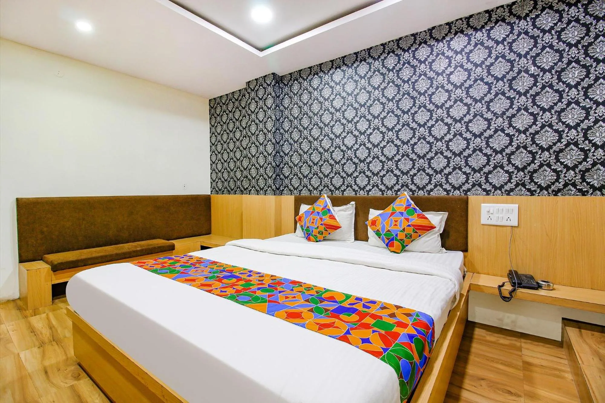 Bed in FabHotel Surbhi