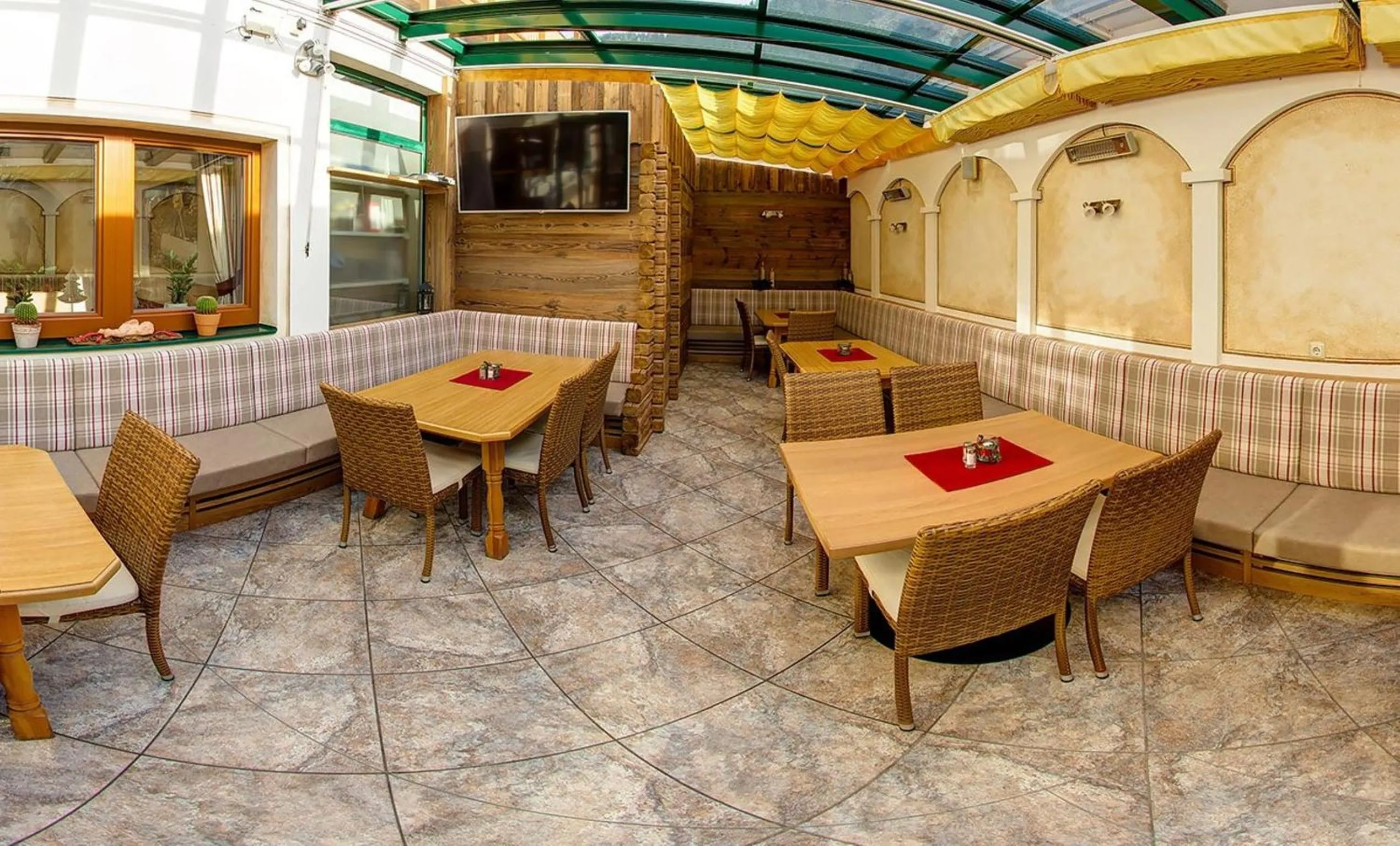 Communal lounge/ TV room in Hotel-Pension Egger