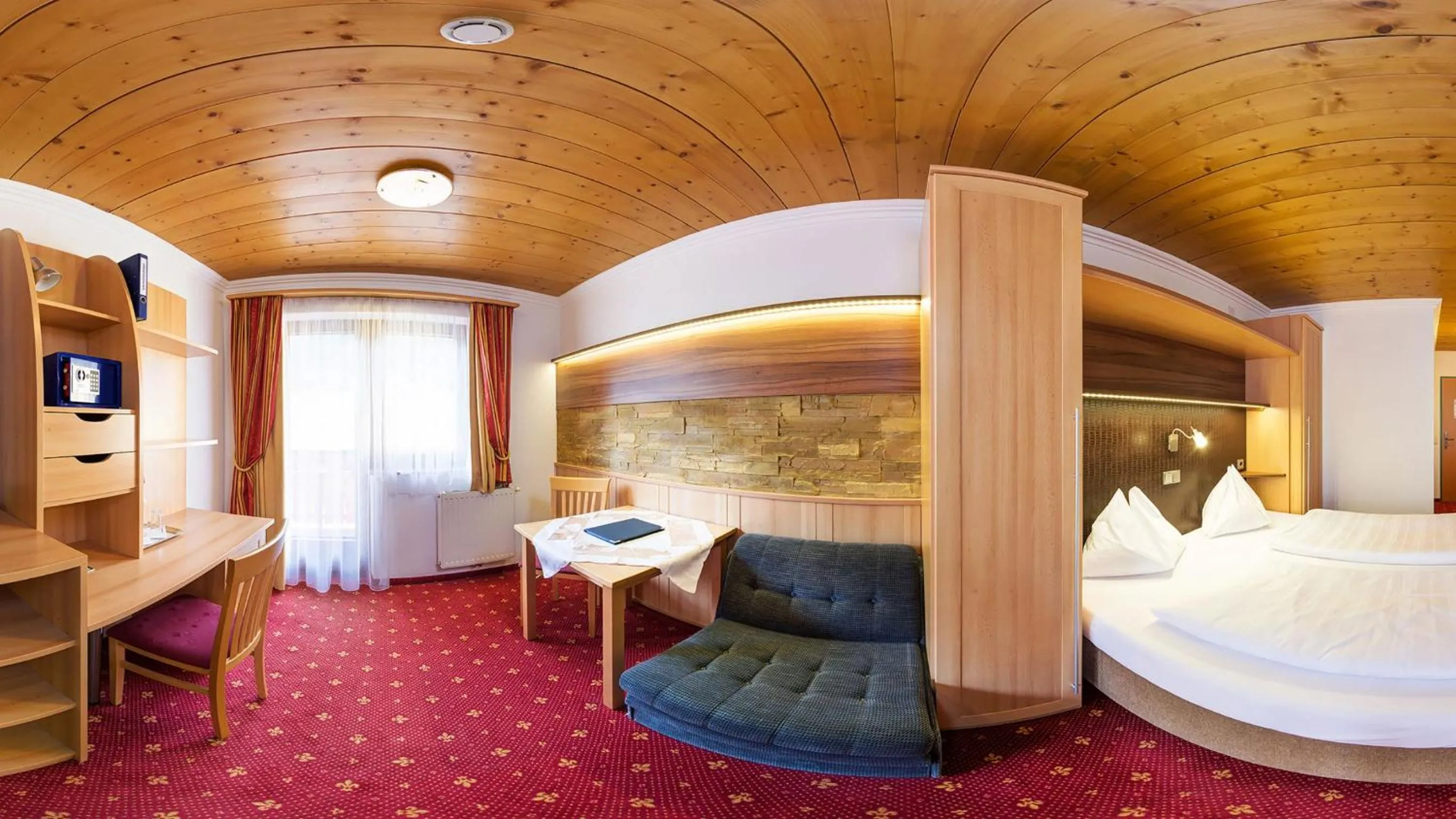 Bed in Hotel-Pension Egger