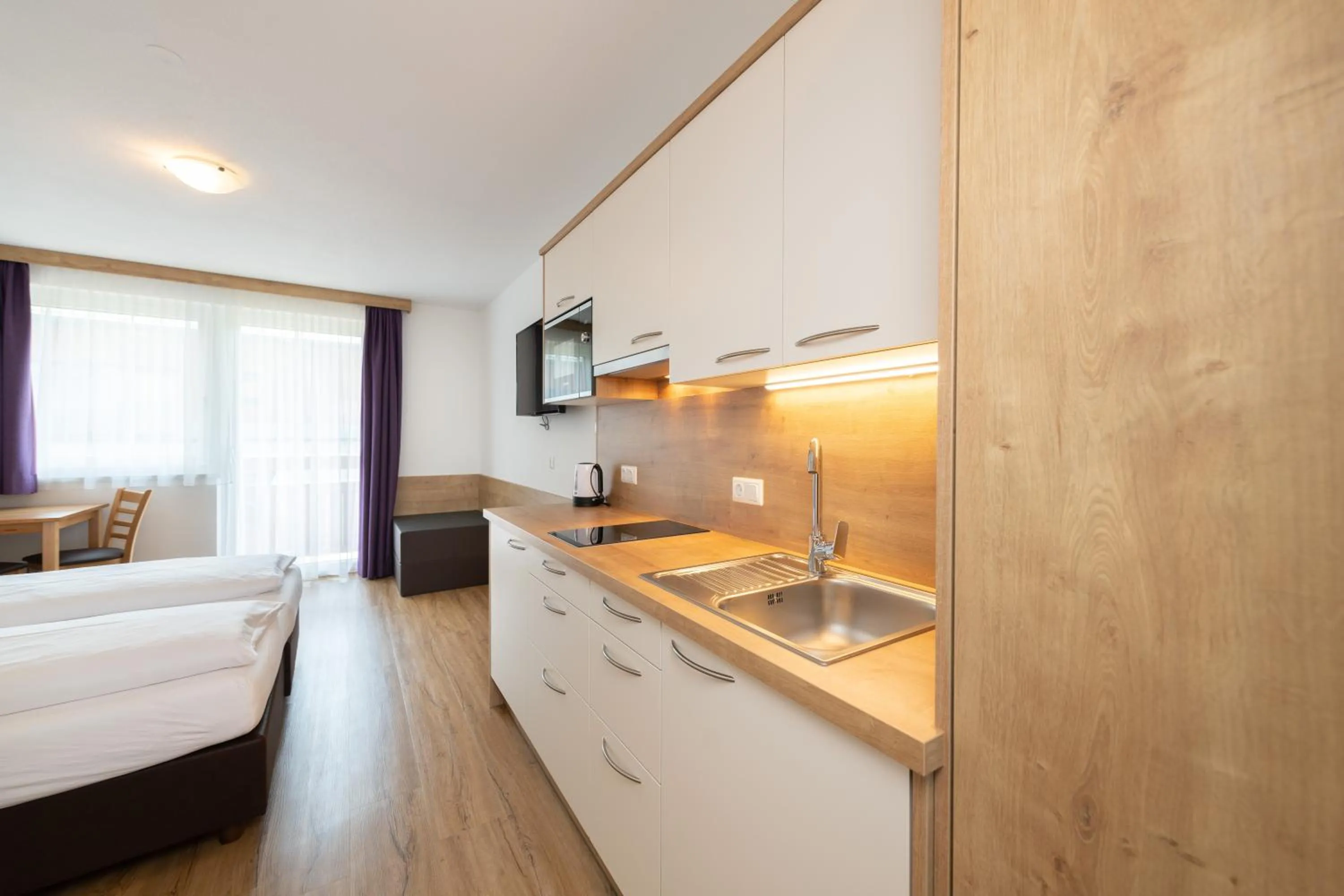 Bed in Hotel-Pension Egger