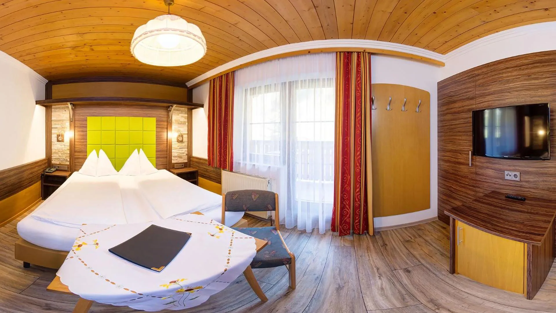 Bed in Hotel-Pension Egger