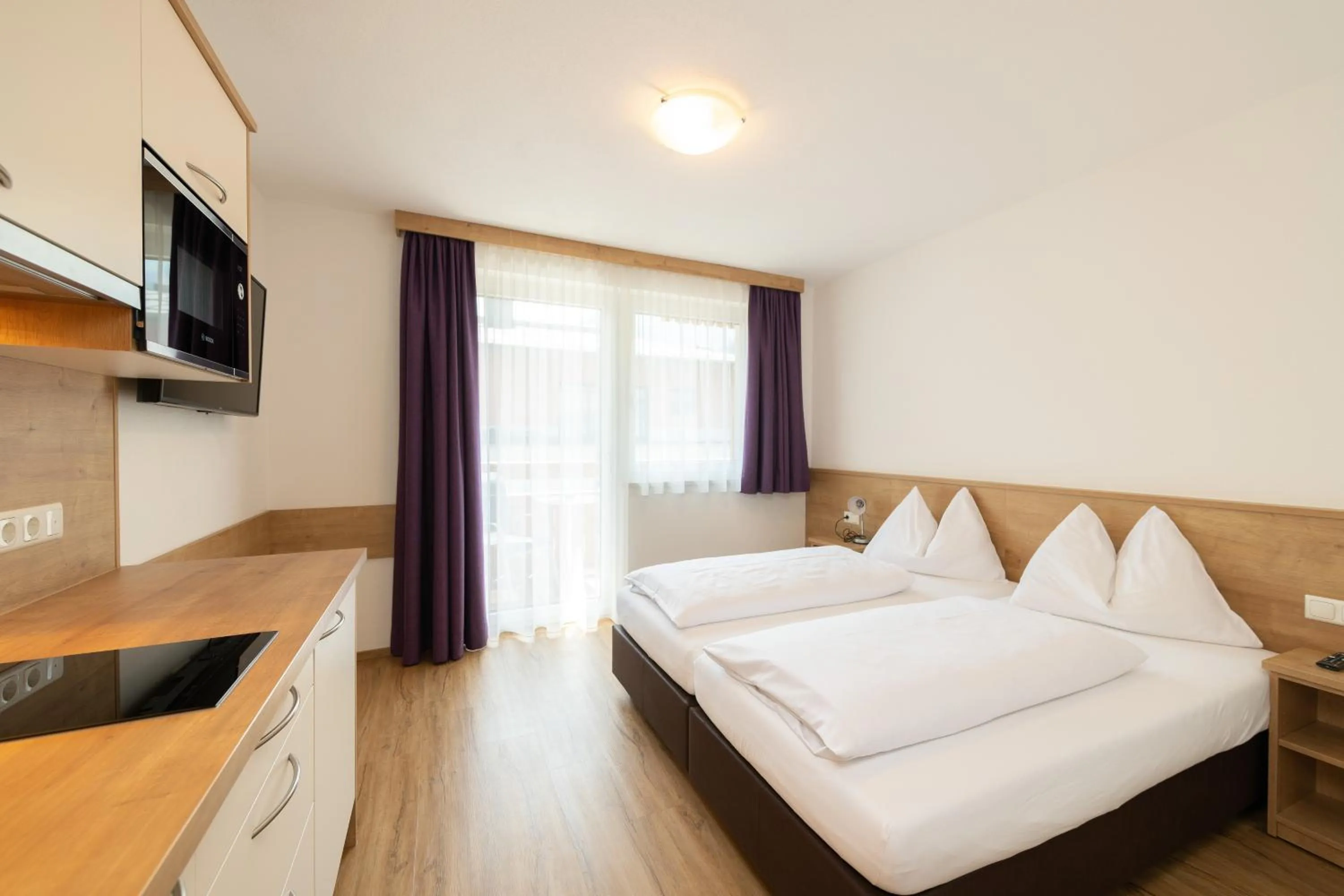 Bed in Hotel-Pension Egger