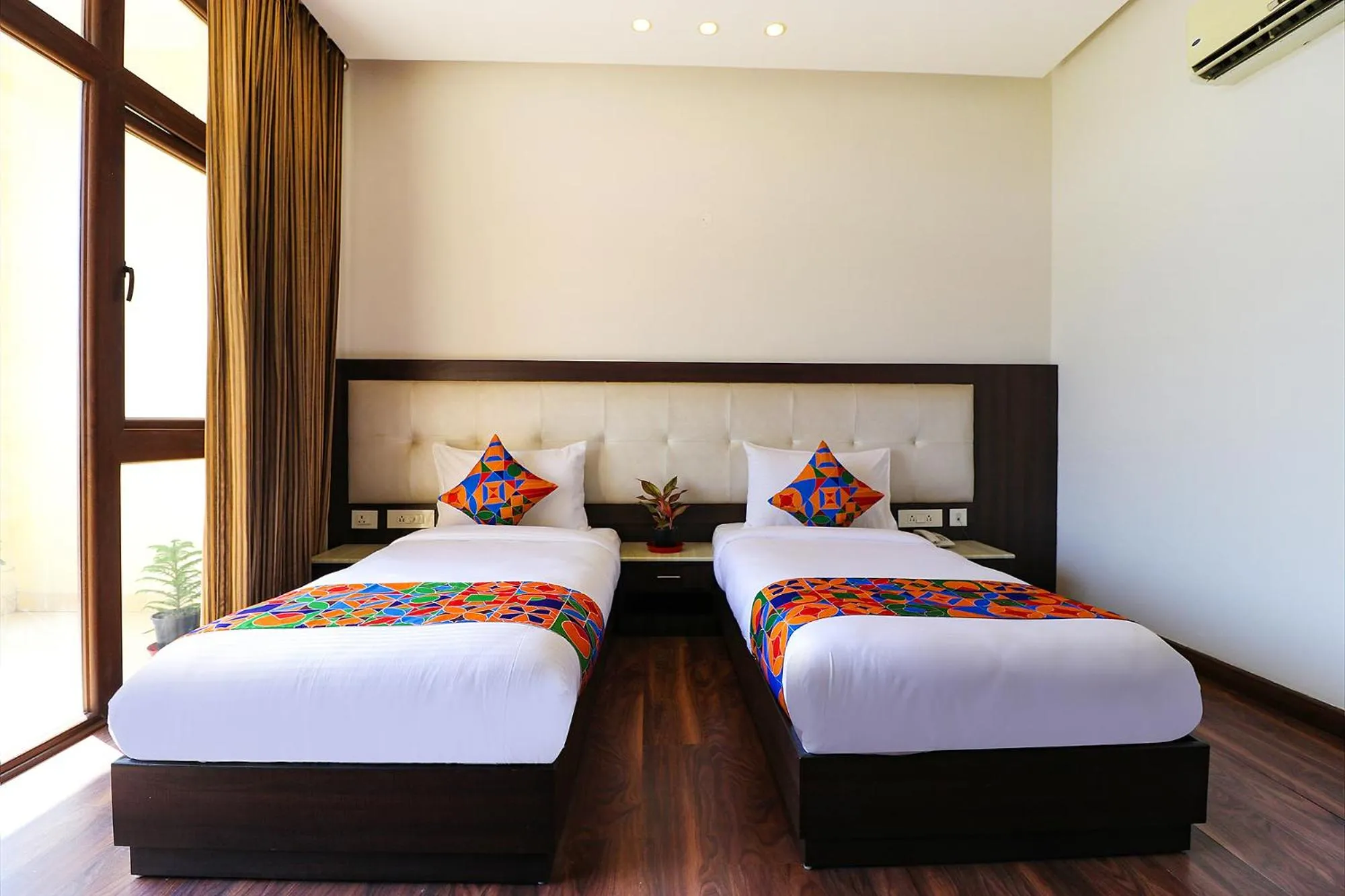 Bed in FabHotel Oyster Villa