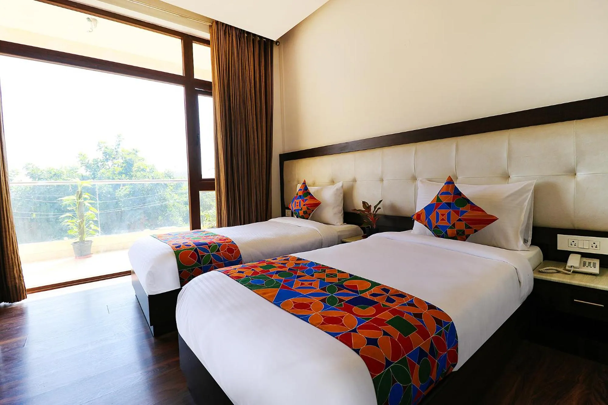 Bed in FabHotel Oyster Villa