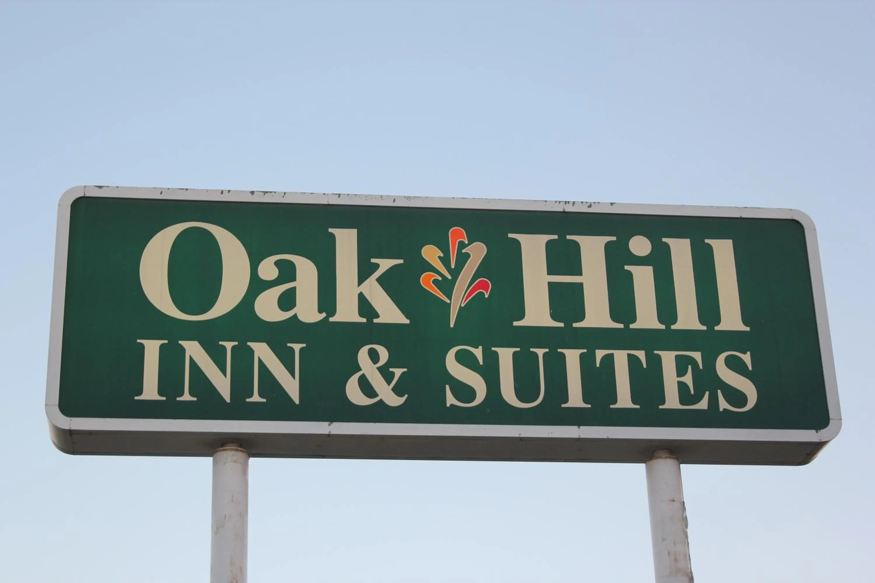 Property logo or sign in Oakhill Inn Tahlequah