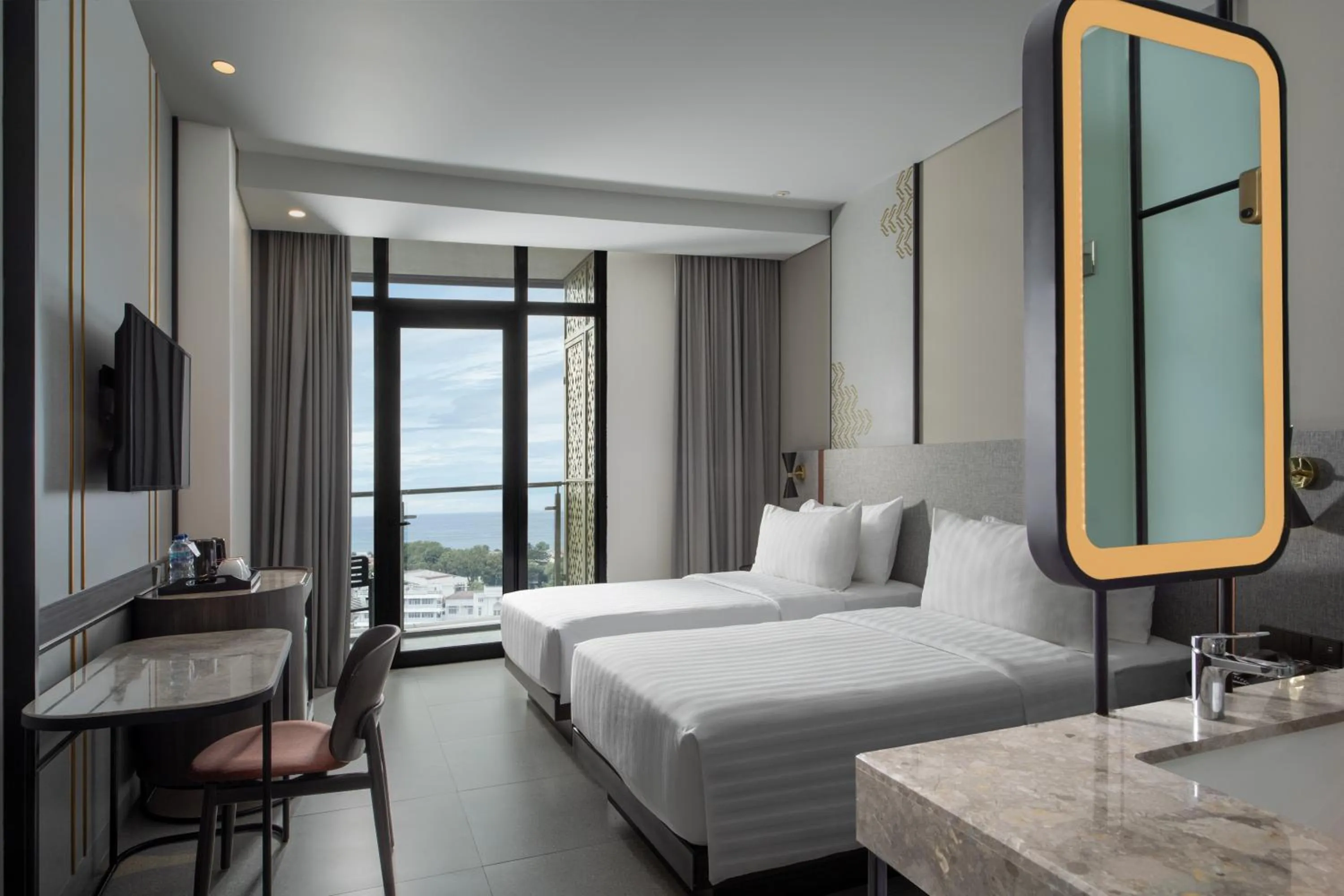 Communal lounge/ TV room, Bed in Hotel Santika Premiere Padang