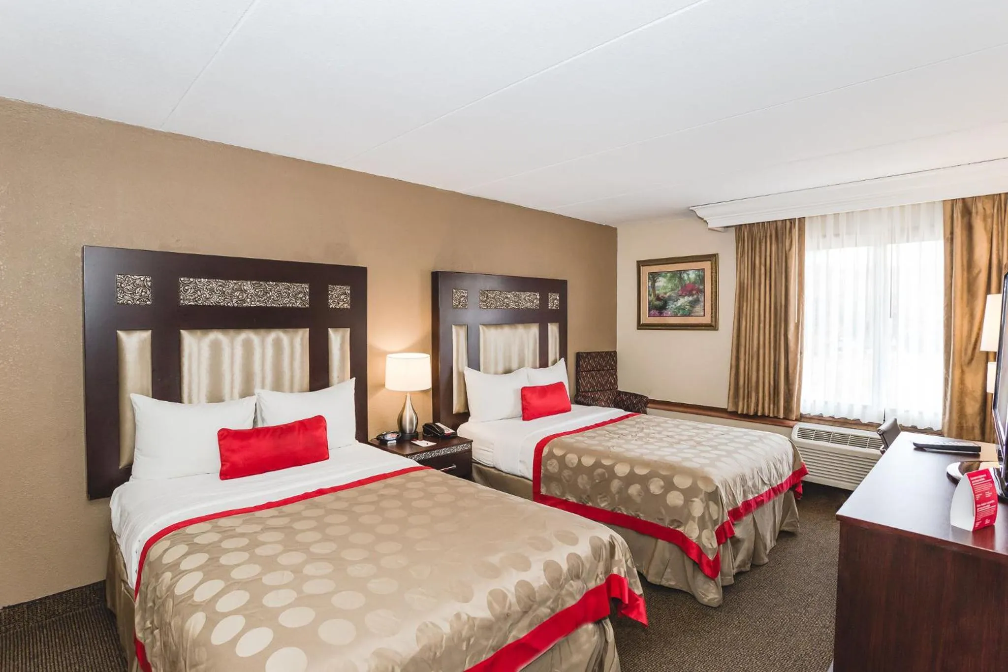 Bed in Ramada by Wyndham Plymouth Hotel & Conference Center