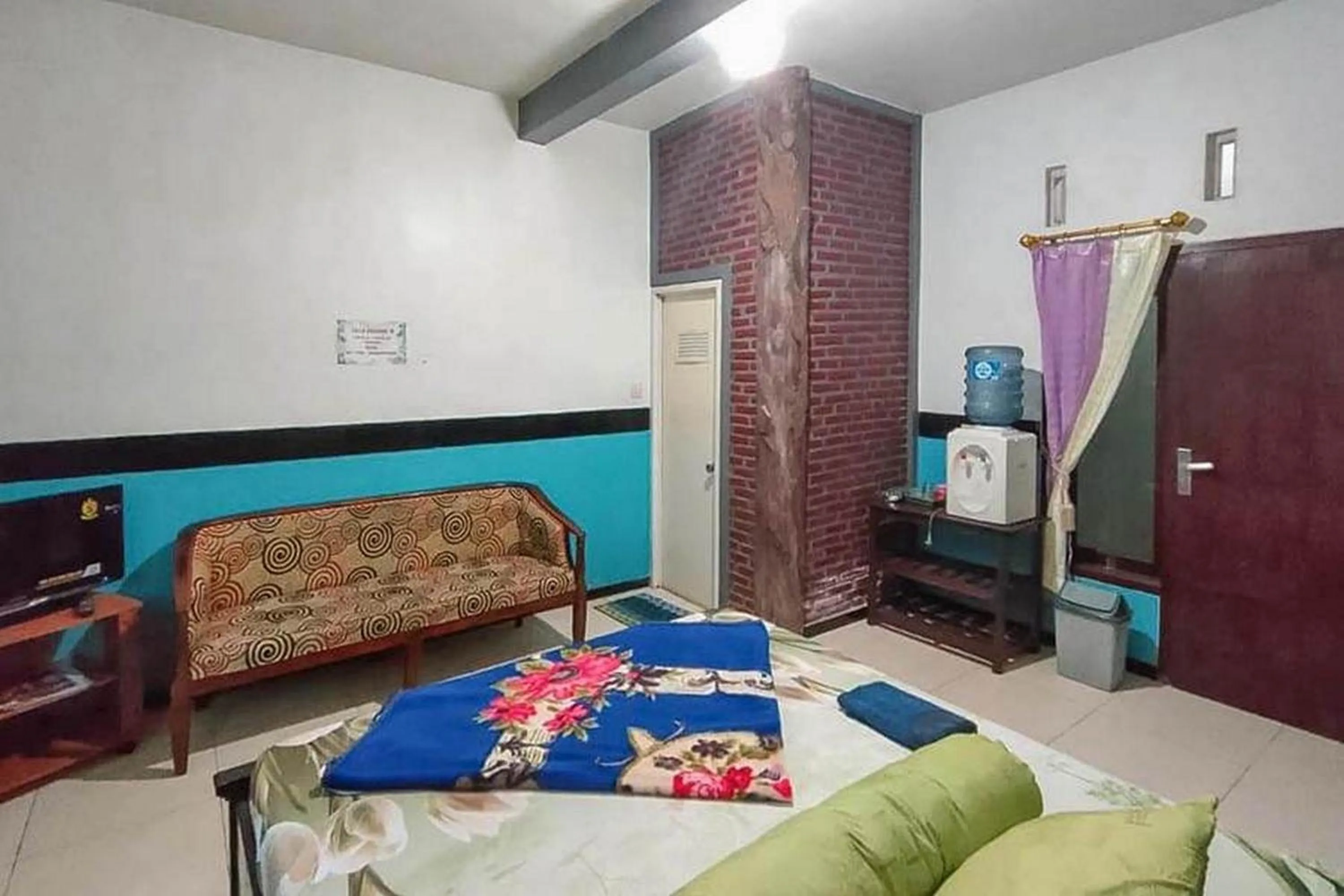 Bed in Villa Ghazani 4 at Desa Wisata Songgokerto