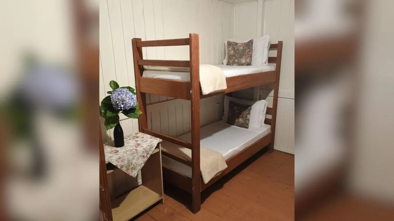 Bed in Villa Chalés Gramado - OH HOTÉIS