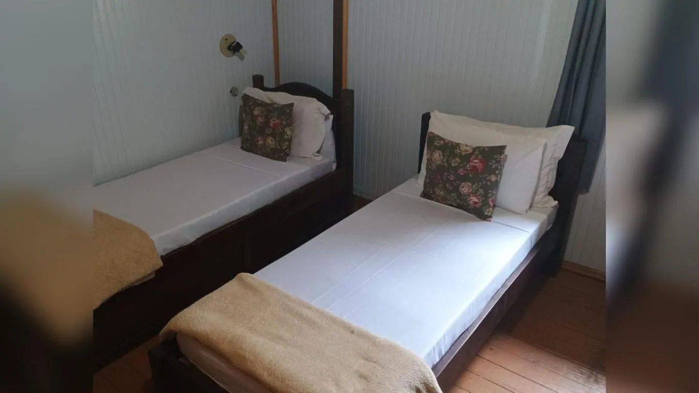 Bed in Villa Chalés Gramado - OH HOTÉIS