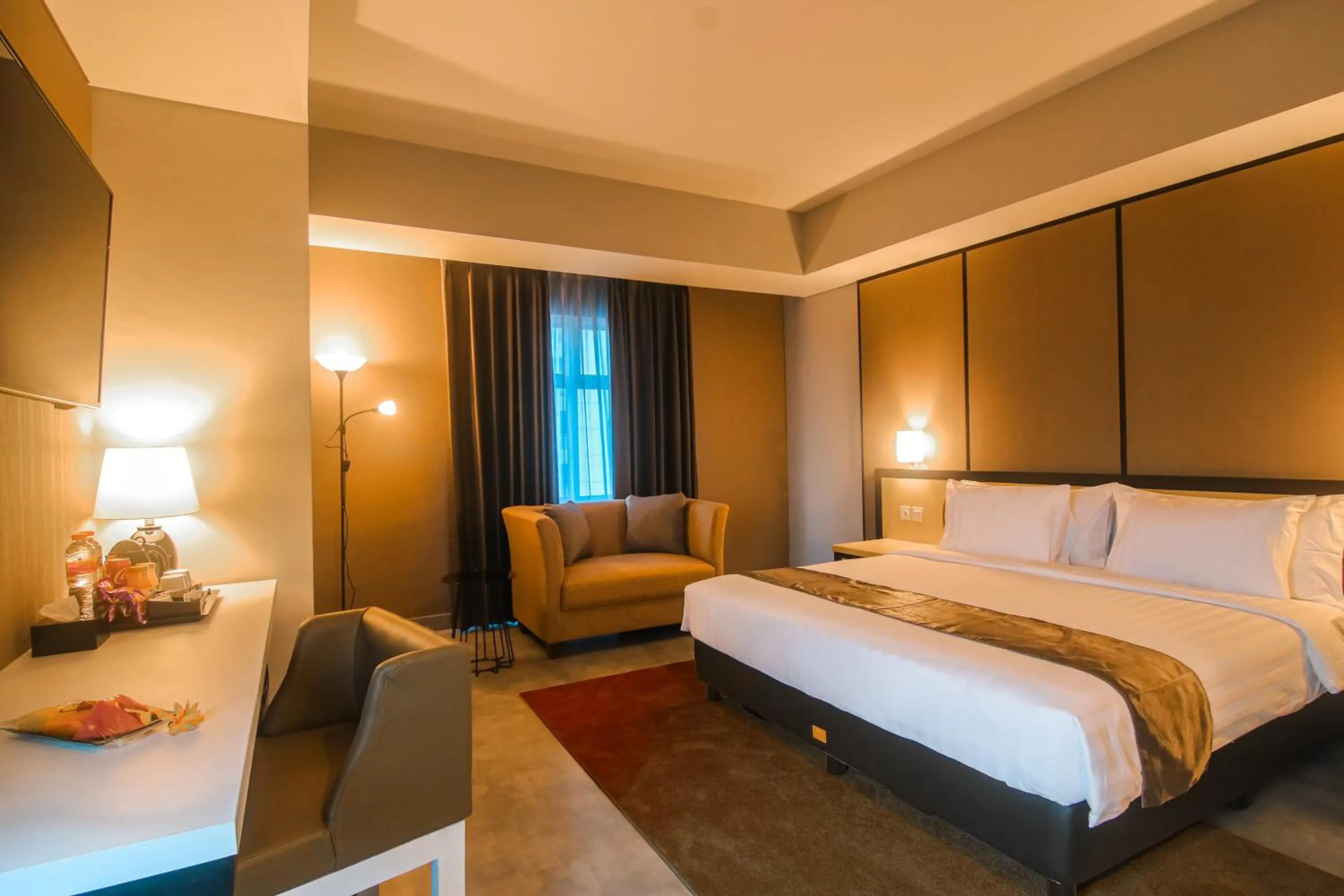 Bed in BeSS Mansion Hotel Surabaya