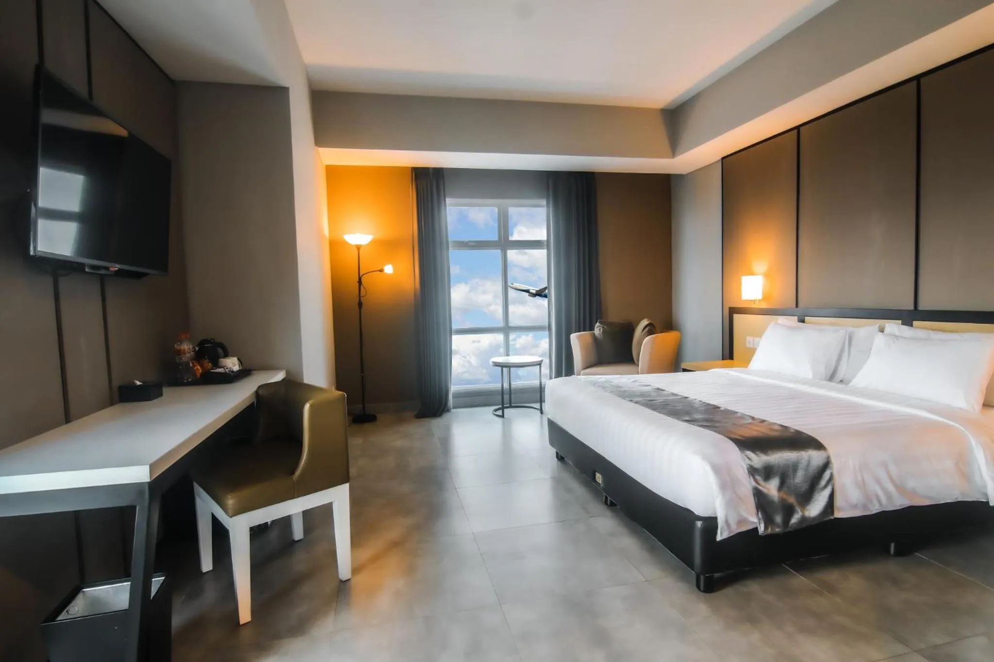 Bed in BeSS Mansion Hotel Surabaya