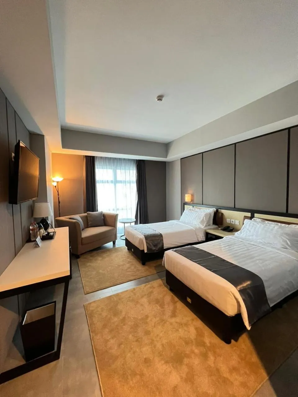 Bed in BeSS Mansion Hotel Surabaya