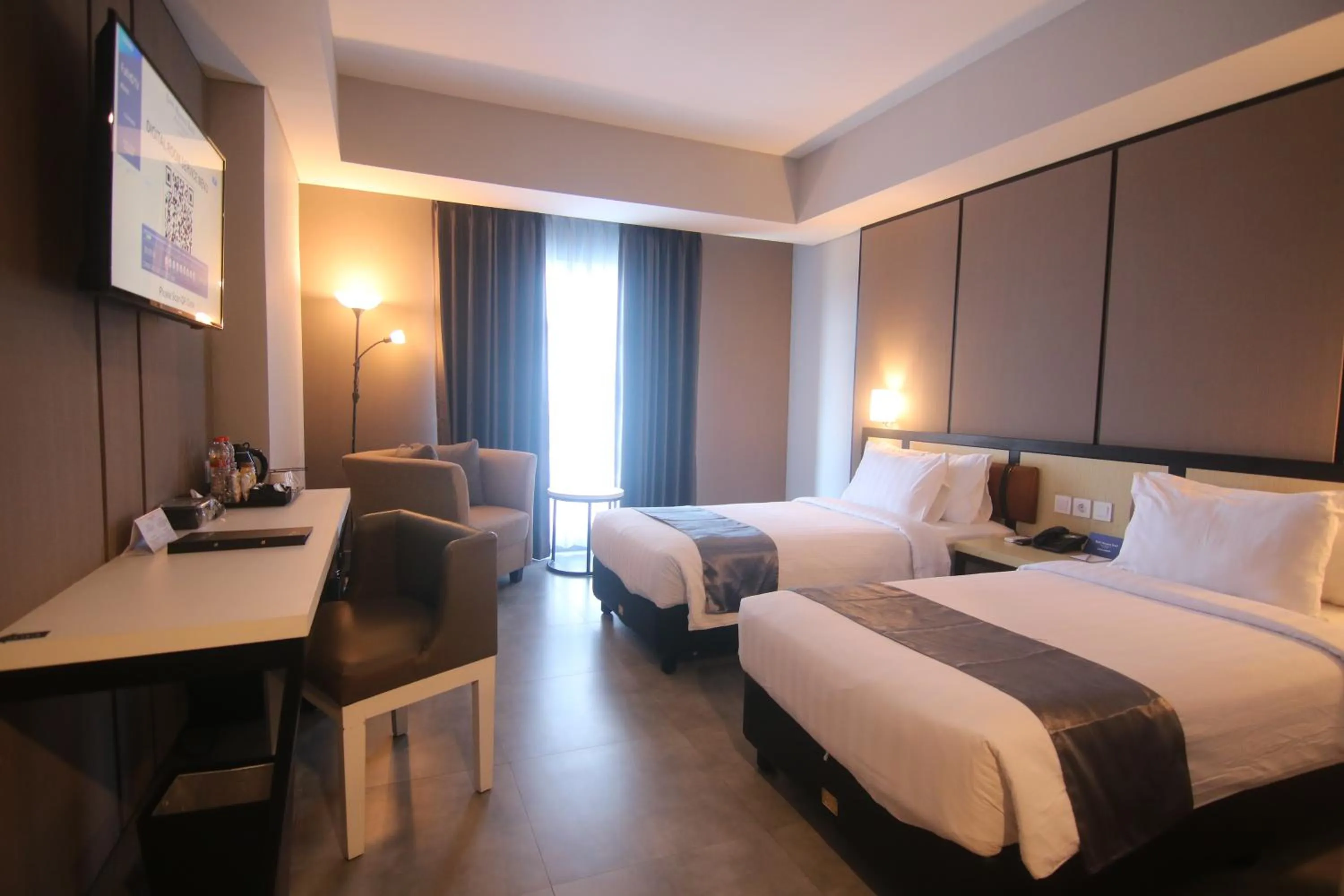 Bed in BeSS Mansion Hotel Surabaya