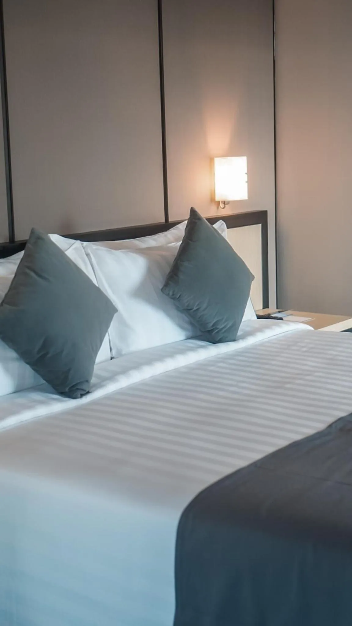 Bed in BeSS Mansion Hotel Surabaya