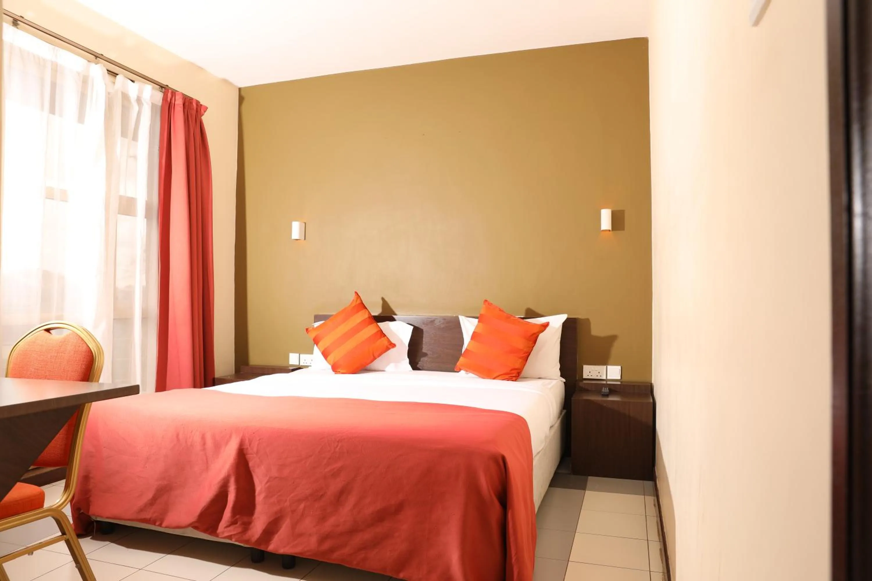 Bed in Qaribu Inn Boutique Hotel Nairobi