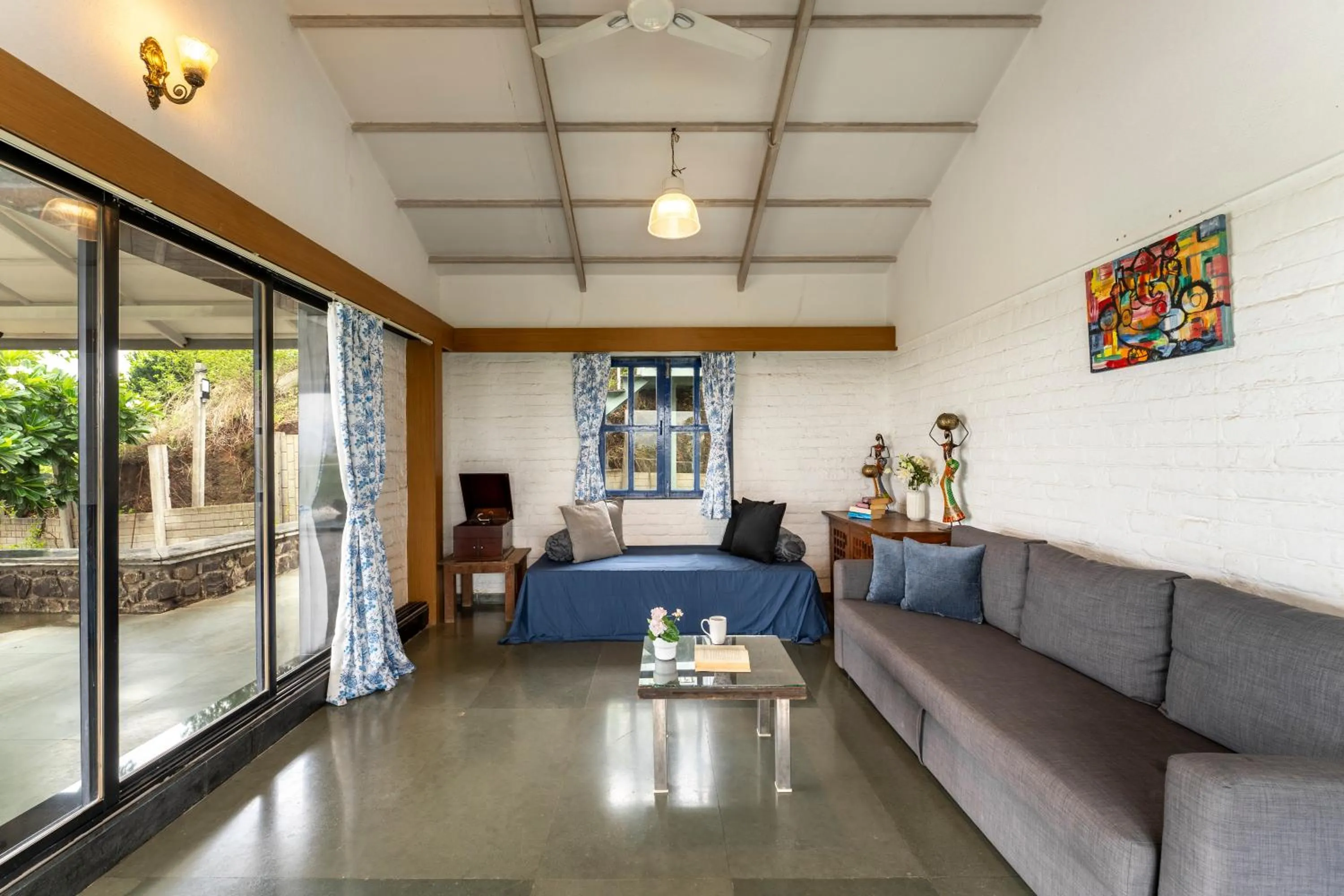 Living room in SaffronStays Le Soil, Igatpuri - pet-friendly villa with viewing deck for panoramic views