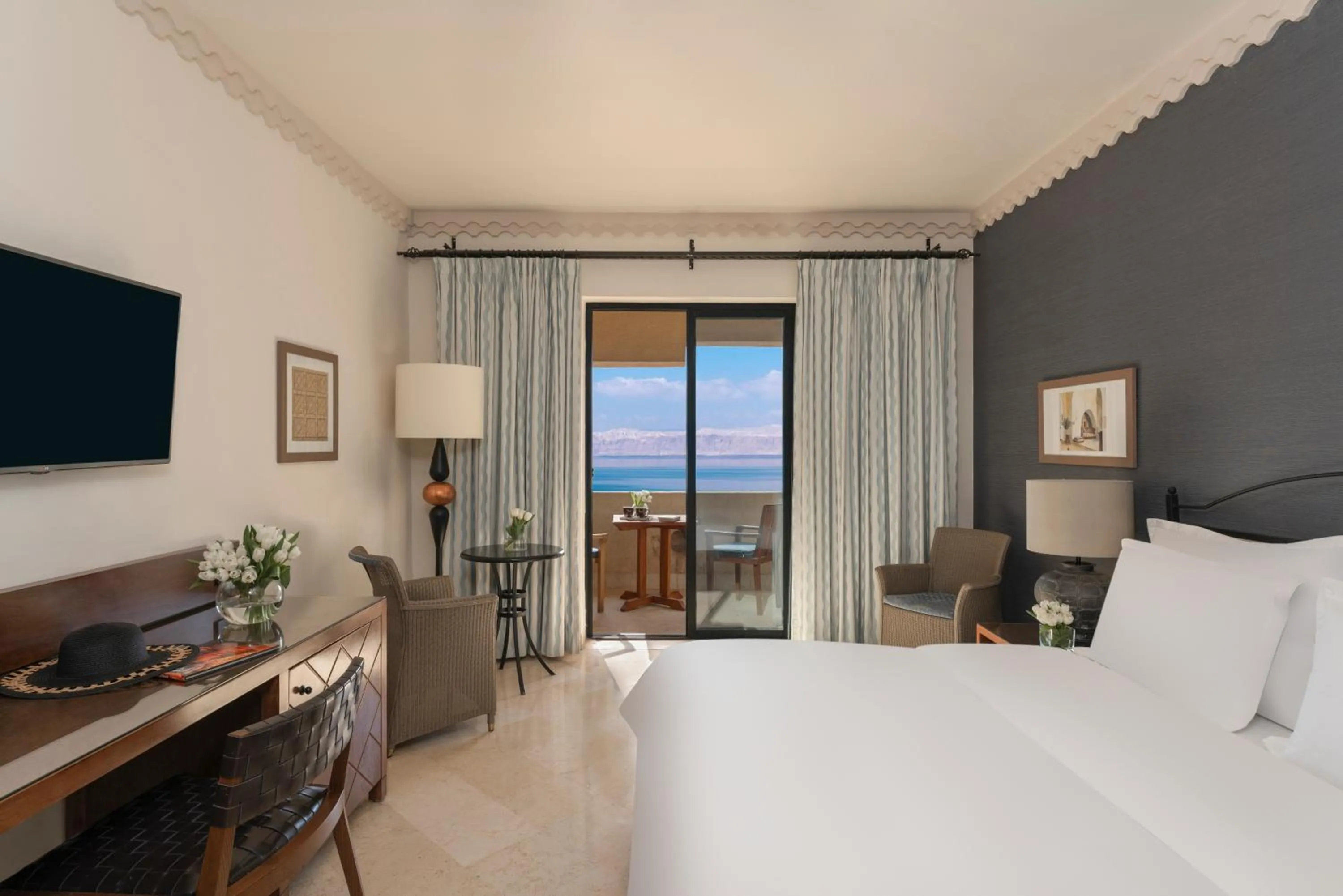 Balcony/Terrace, Bed in Mövenpick Resort & Spa Dead Sea