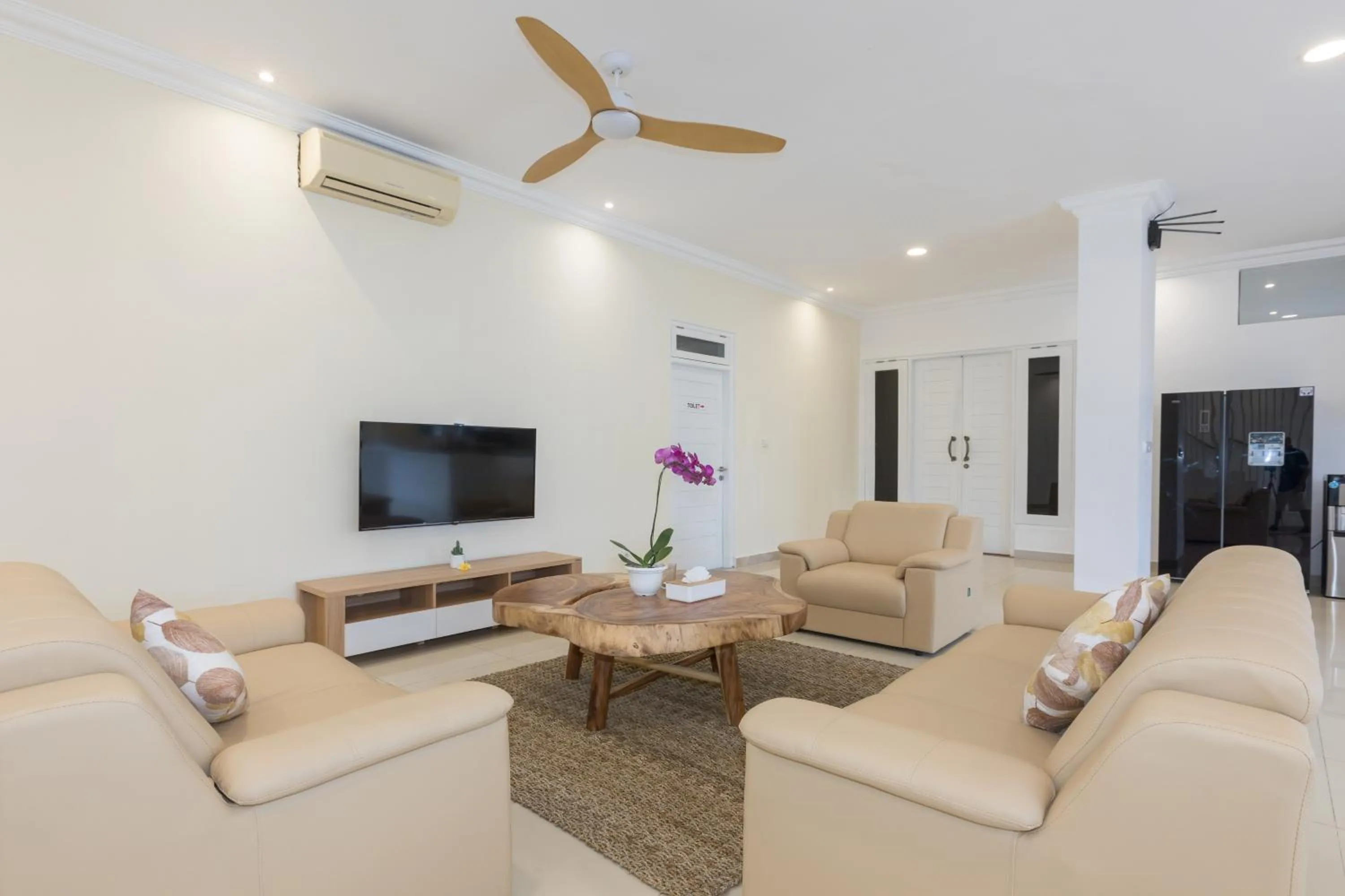 Communal lounge/ TV room in Villa Haka Jimbaran by Nagisa Bali