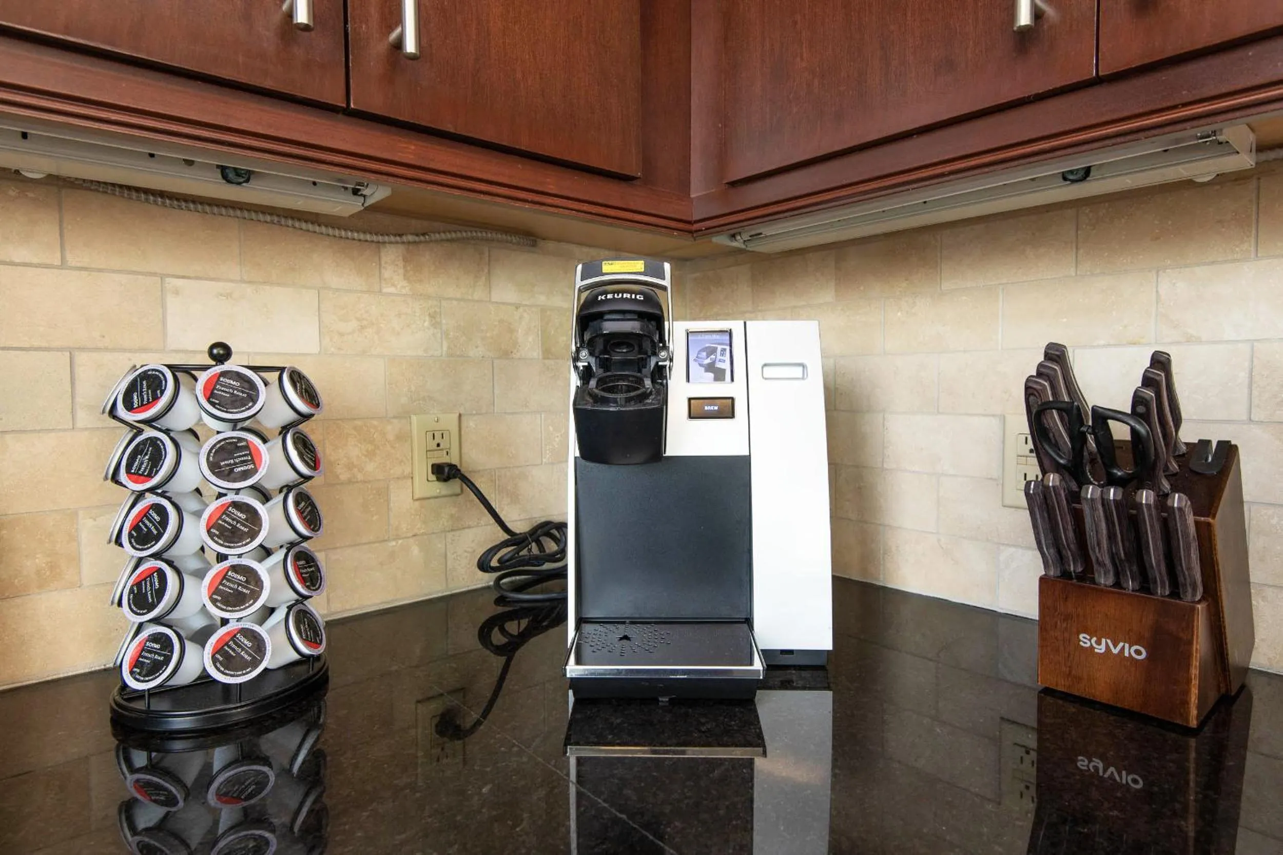 Kitchen or kitchenette in Sky-Rise Apartments