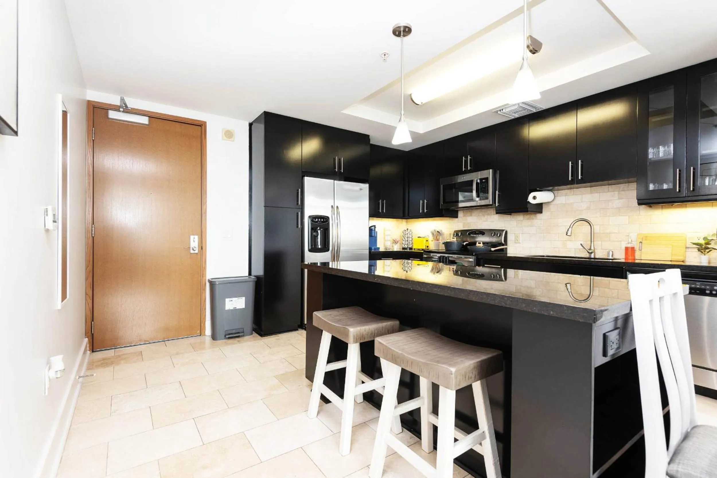 Kitchen or kitchenette in Sky-Rise Apartments