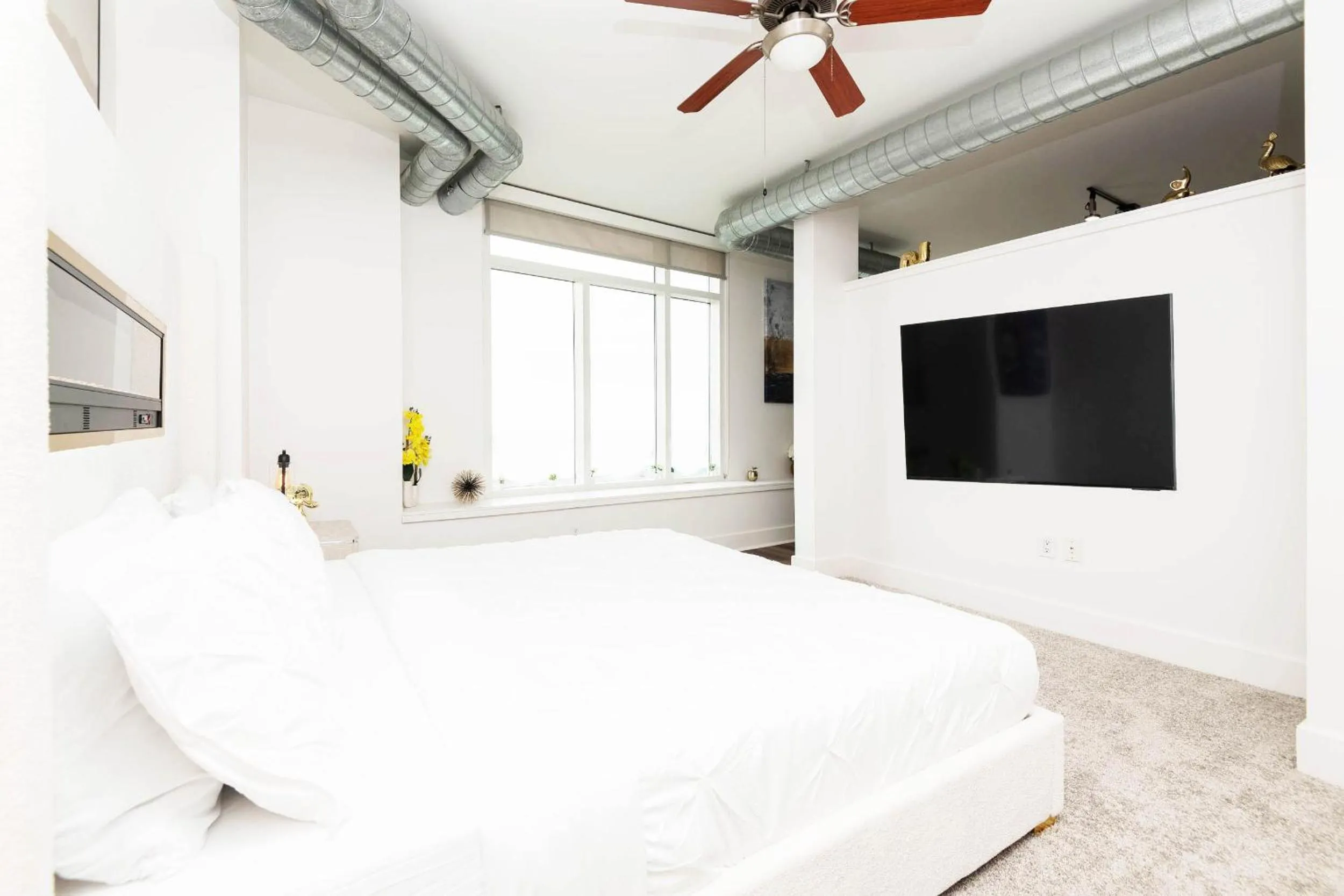 Bed in Sky-Rise Apartments