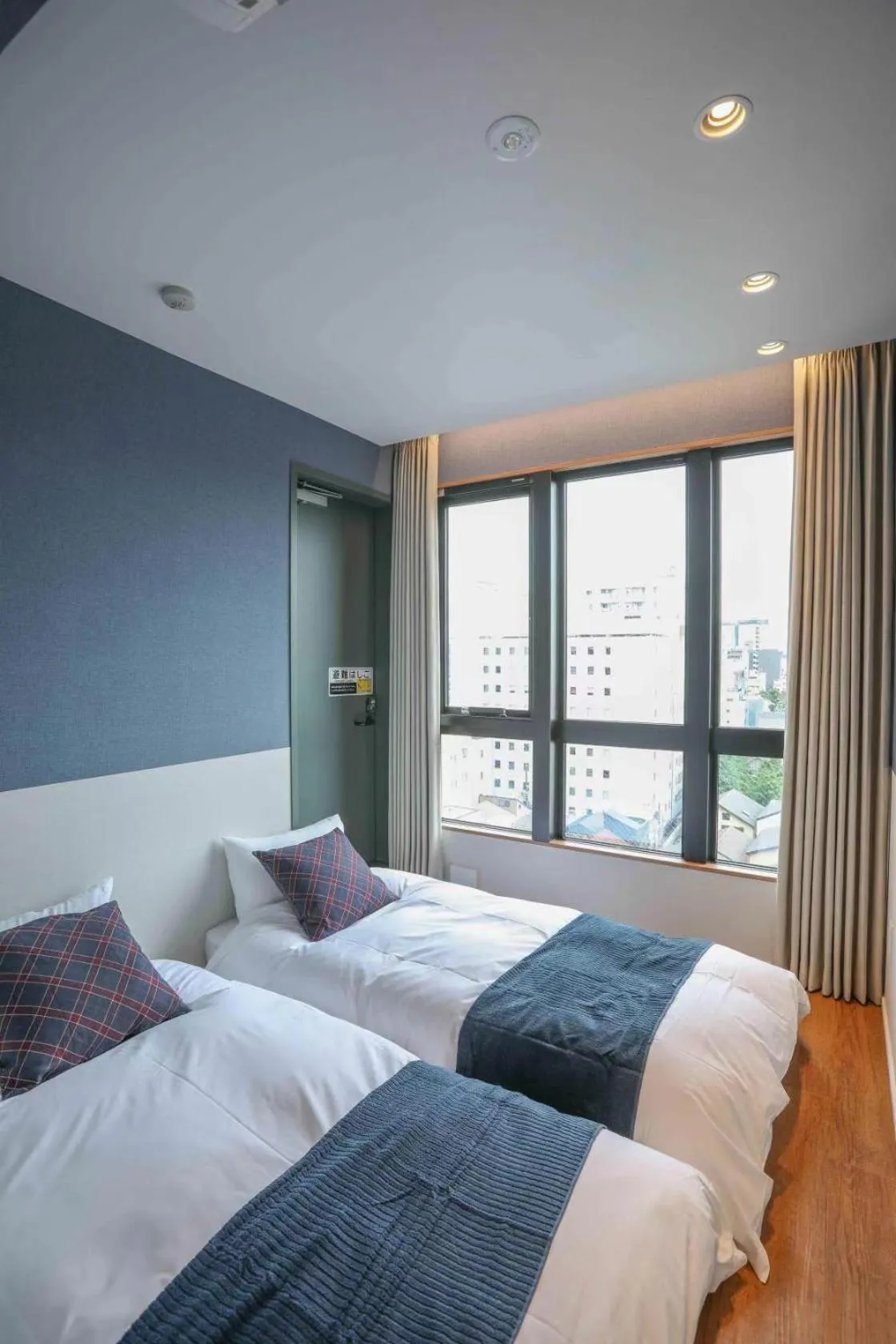 Bed in the Moto Hotel Asakusa